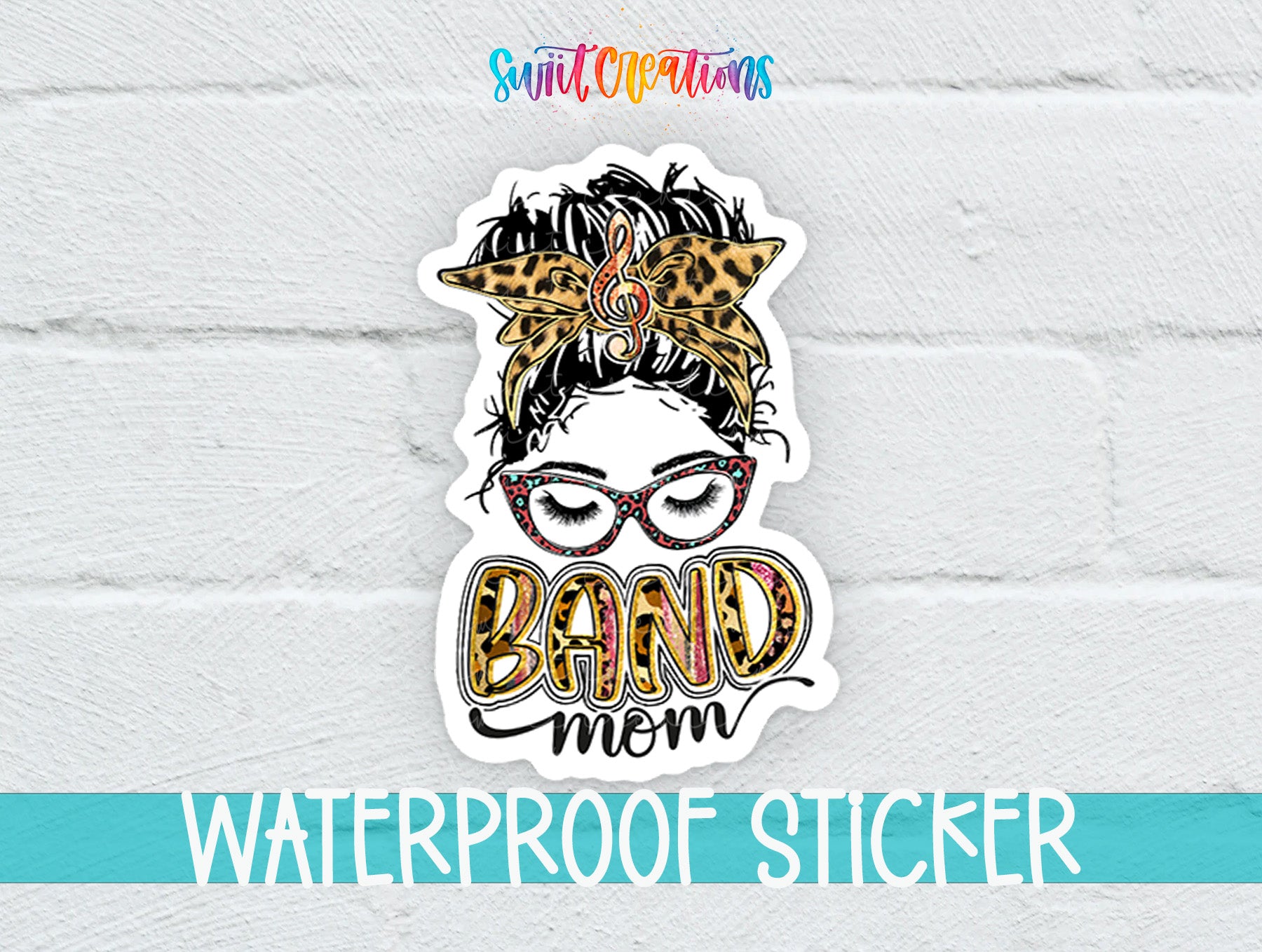 A sticker with a stylized image of a woman's face wearing glasses and a leopard print headband, along with the text "BAND MOM" and "WATERPROOF STICKER" printed on it.