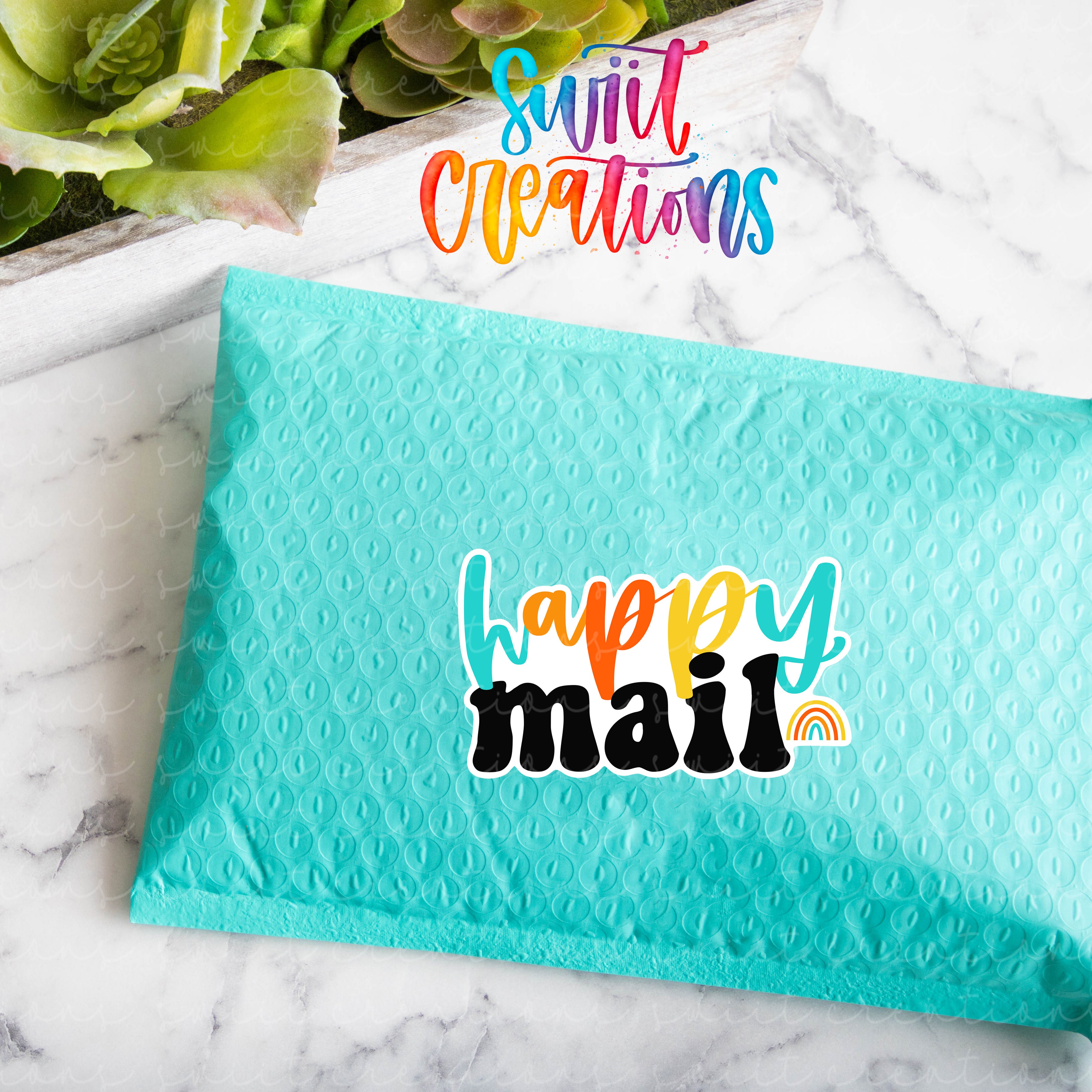 a blue envelope with the words happy mail printed on it