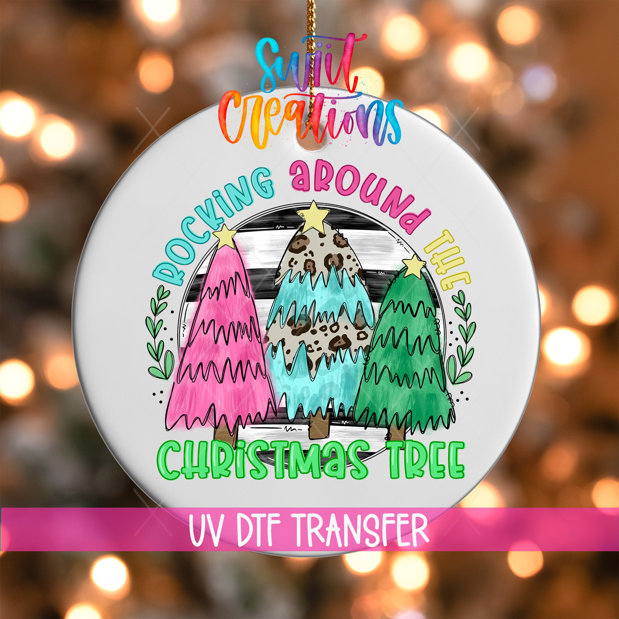 A colorful ornament featuring a Christmas tree with three different colored trees, surrounded by text that reads "Rocking around the Christmas tree".