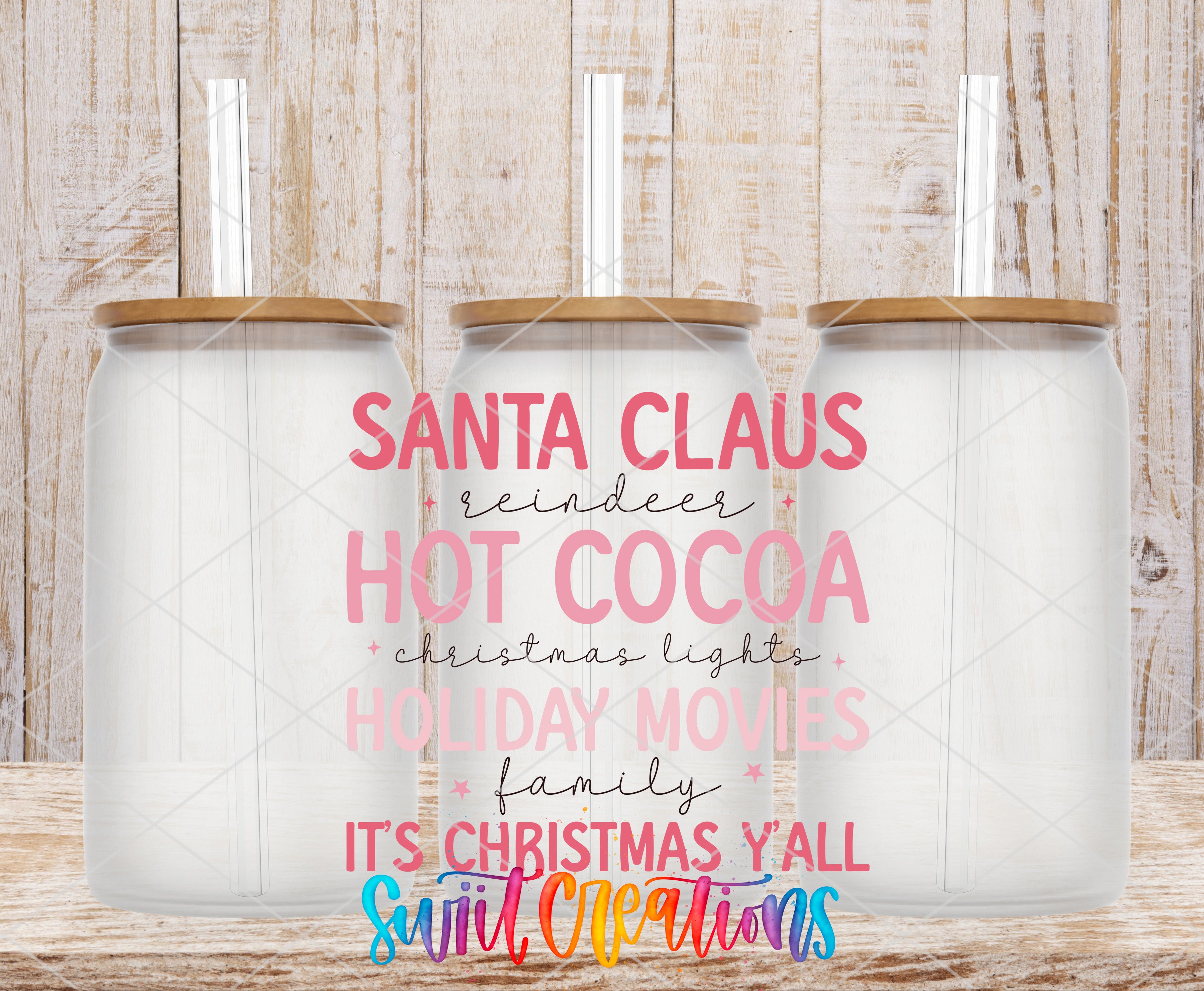 three glass jars with lids, arranged in a row against a wooden background. The text on the jars reads "Santa Claus, hot cocoa, Christmas lights, holiday movies, family, it's Christmas y'all, sugary creations".