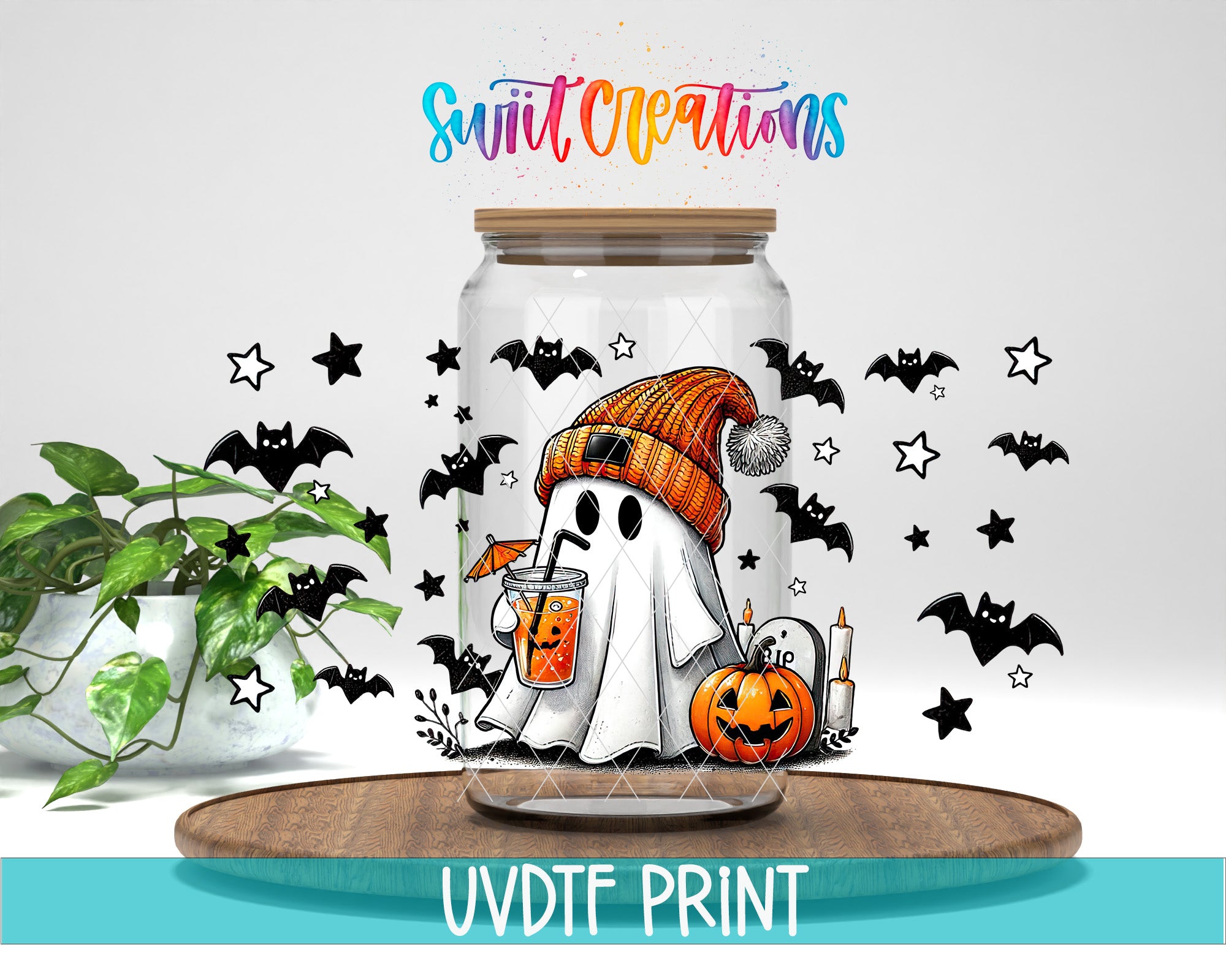 A glass jar with a Halloween-themed design, including a ghost, pumpkin, and bats, along with the text "Swift Creations" and "UVDF PRINT".