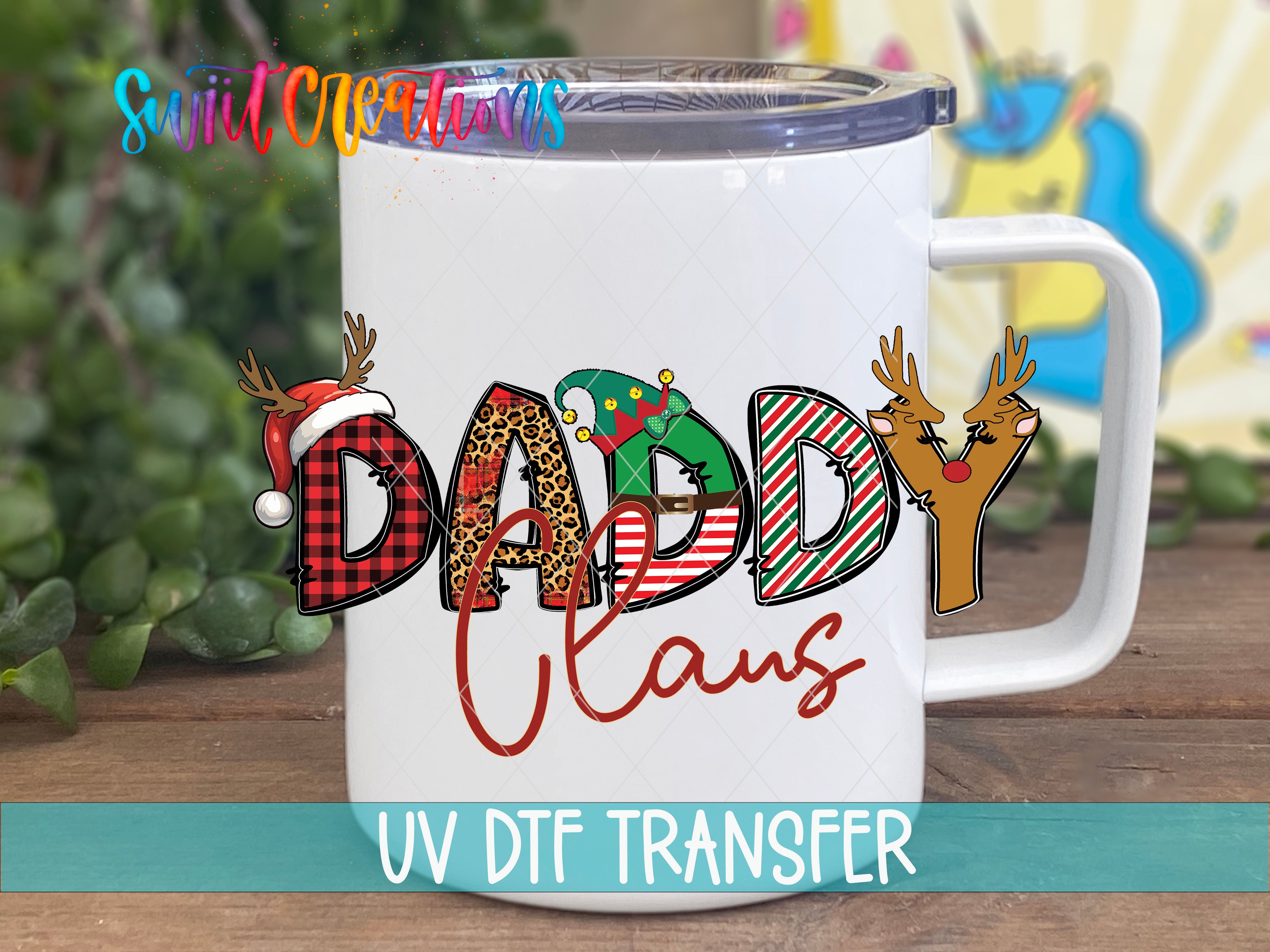 A white mug with the word "DADY CLANS" printed on it, along with various Christmas-themed graphics and text.