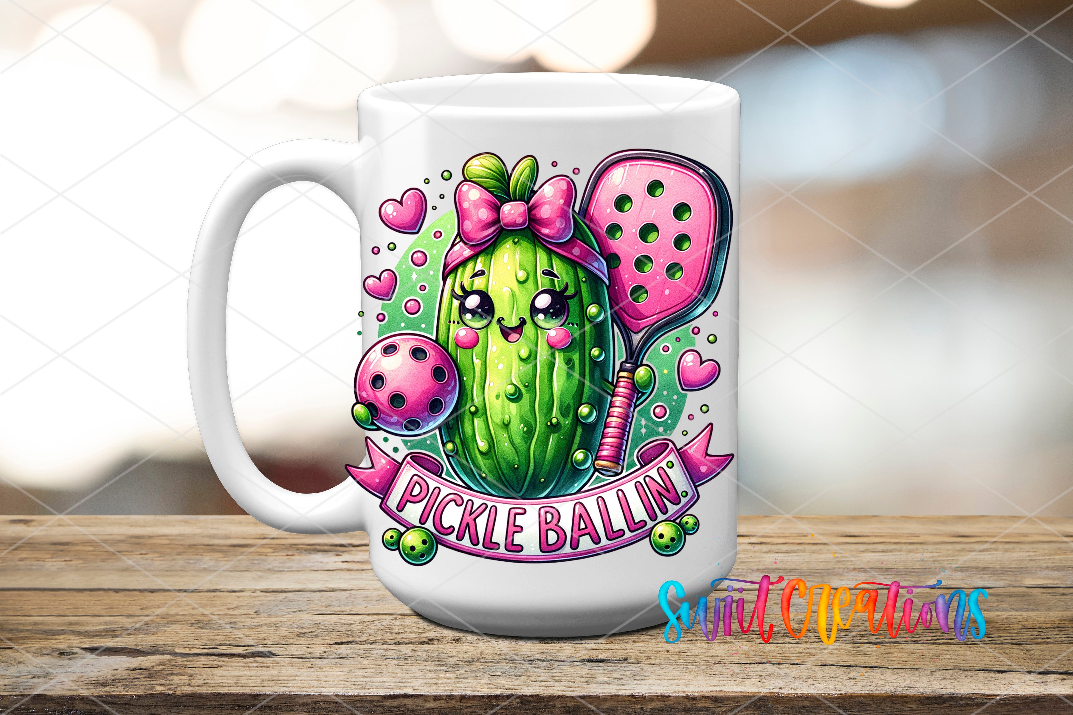 A white mug with a colorful illustration of a pickle on it, along with the text "Pickle Ballin'".