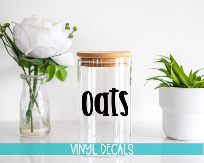 a glass jar with the word oats written on it next to a vase with