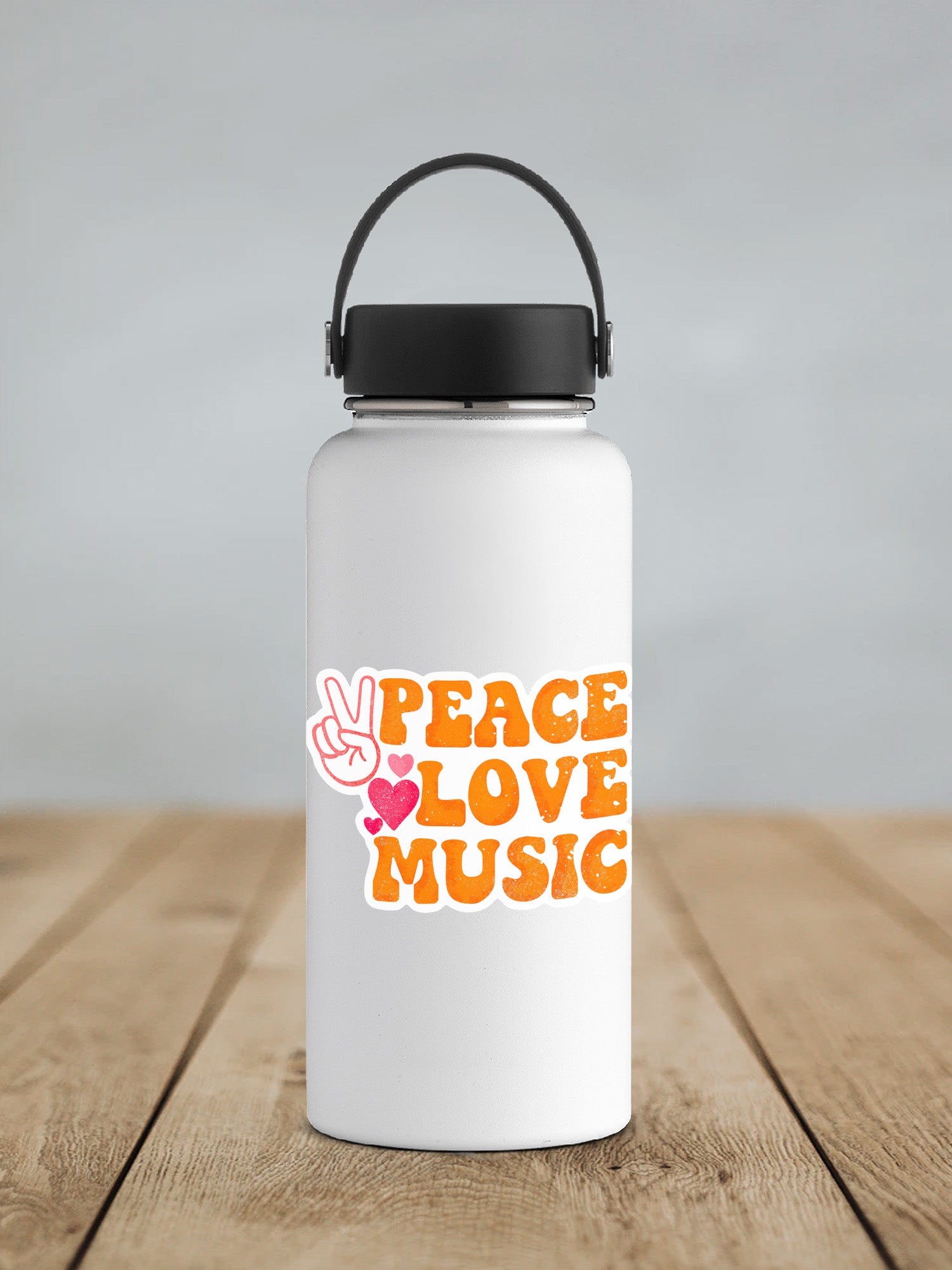 a white water bottle sitting on top of a wooden table