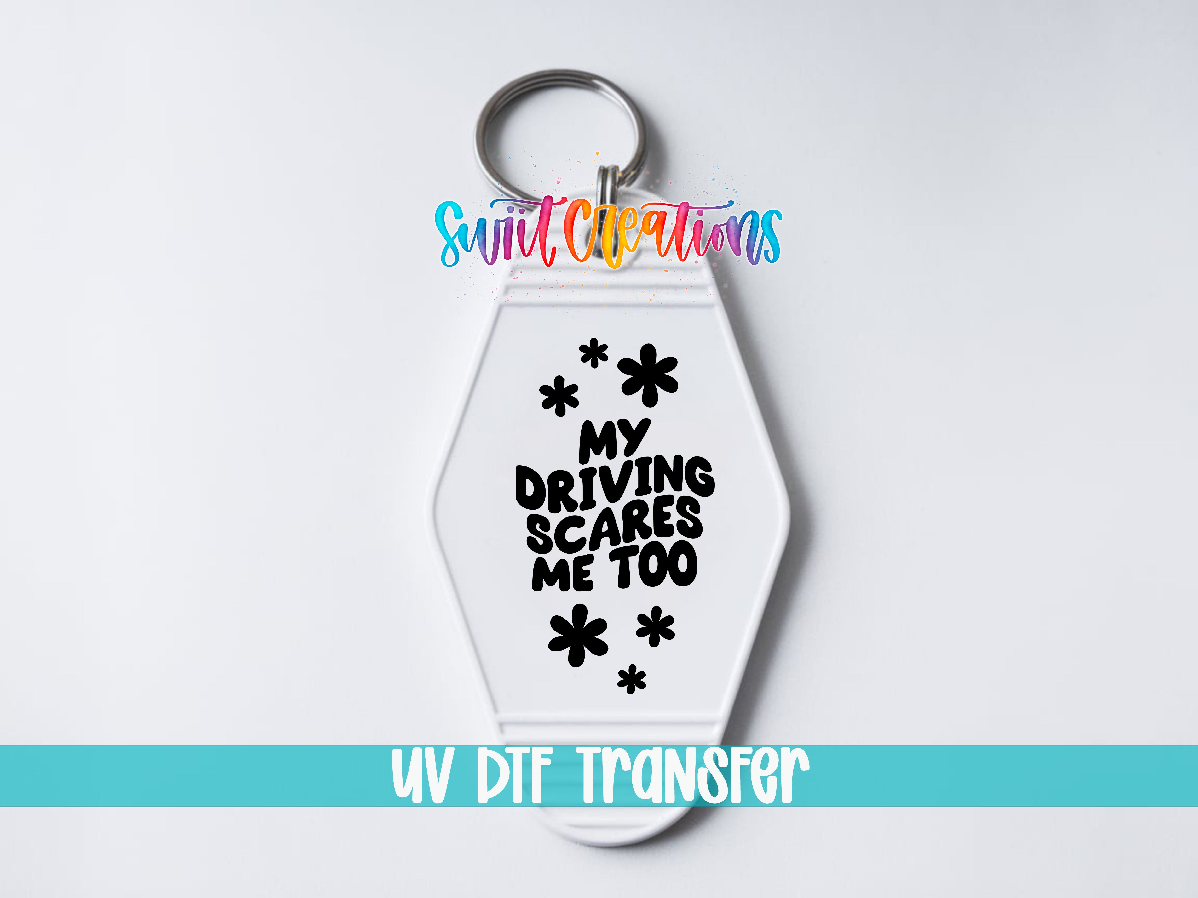 A keychain with a message printed on it, which says "My Driving Scares Me Too".