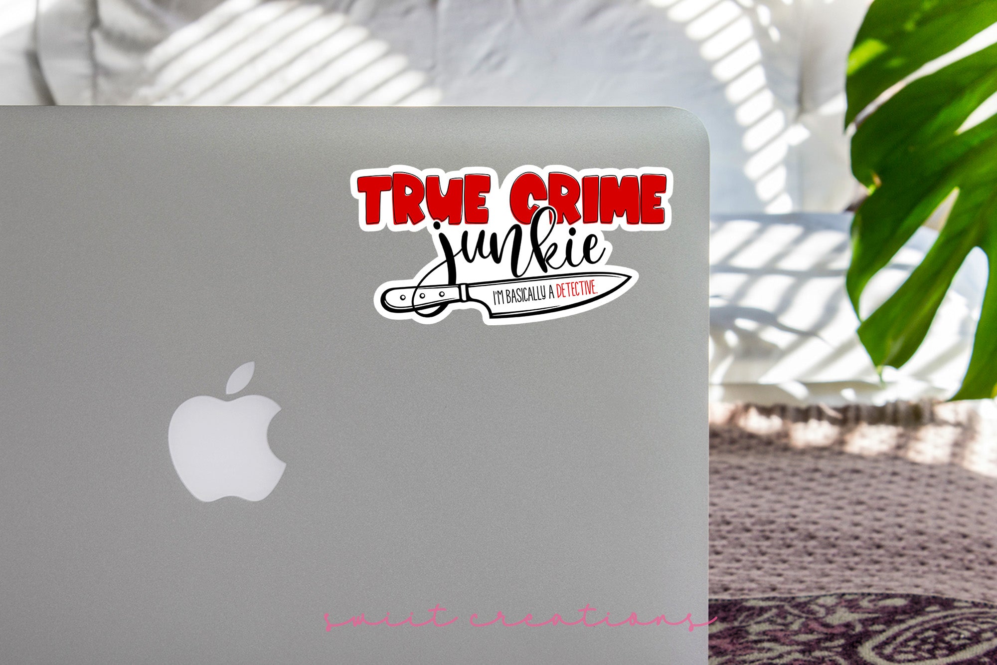 a laptop computer sitting on top of a table