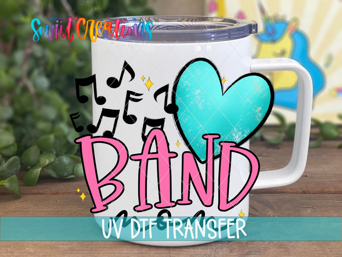 Band Mom UV DTF transfer displayed on a white coffee mug from Swiit Creations