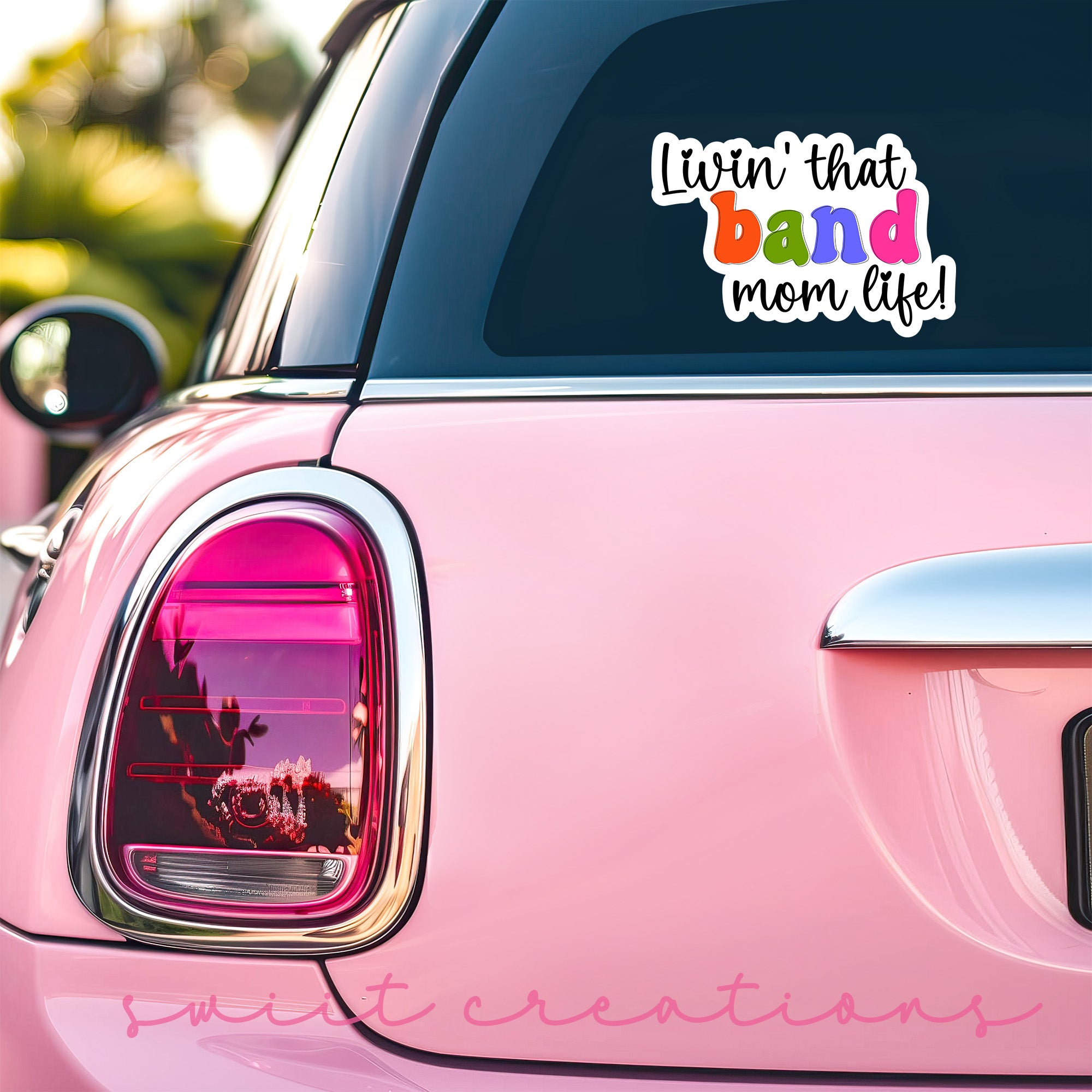 a pink car with the words liv't that band mom die on it