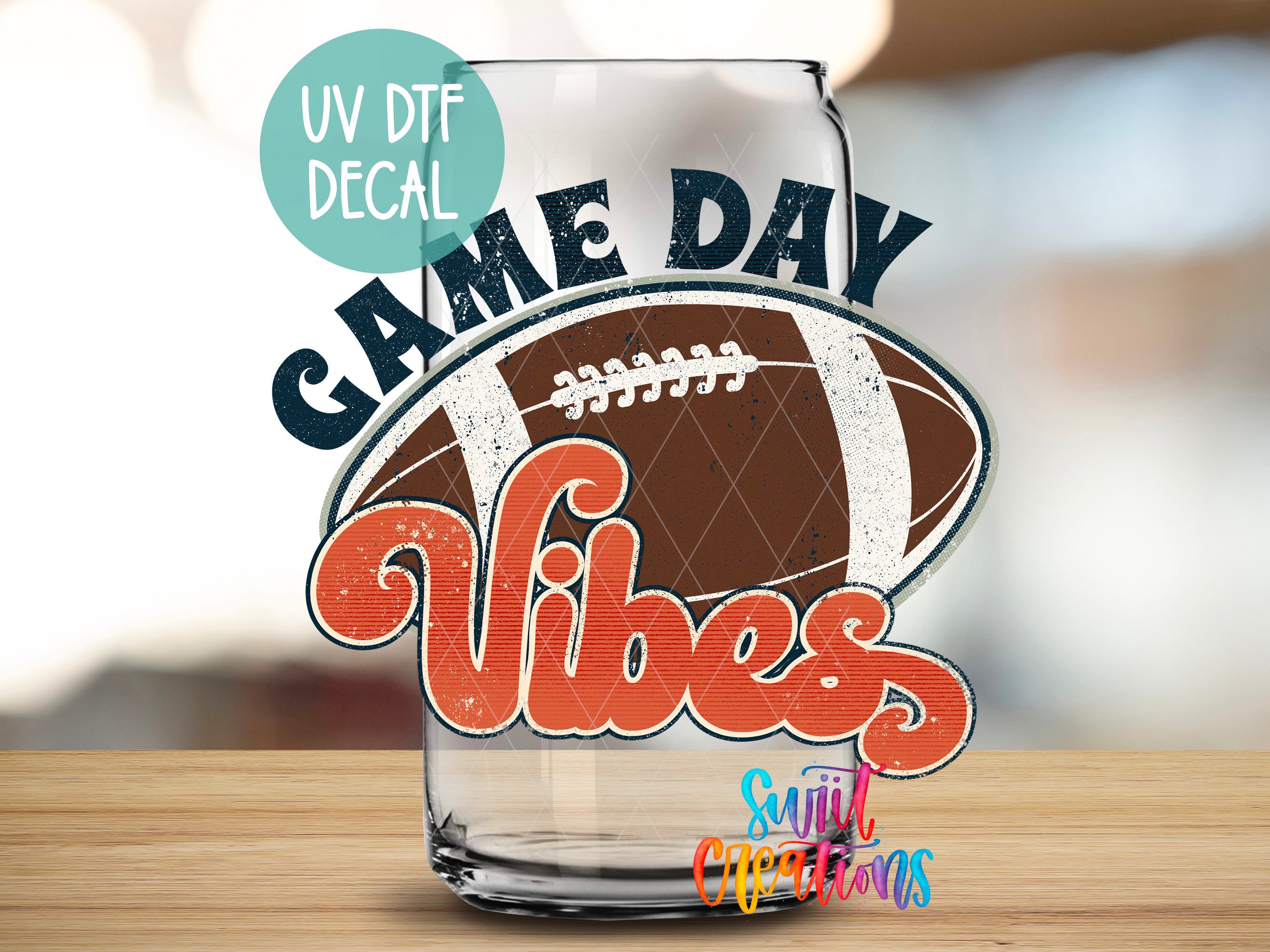 a shot glass with a football and the words game day vibes
