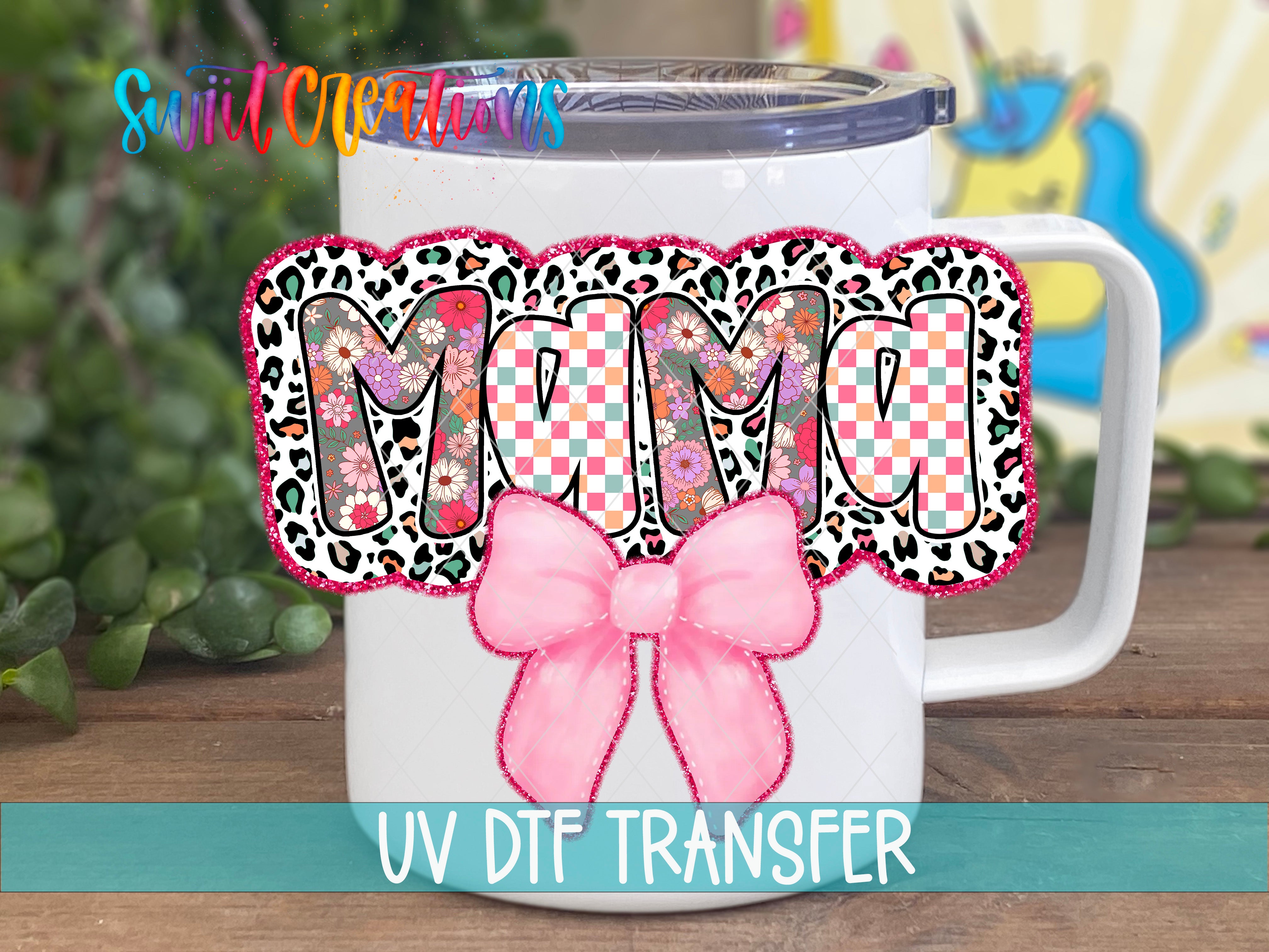 A white mug with a colorful leopard print design and a pink bow, along with the text "Mama" and "UV Dtf Transfer" printed on it.