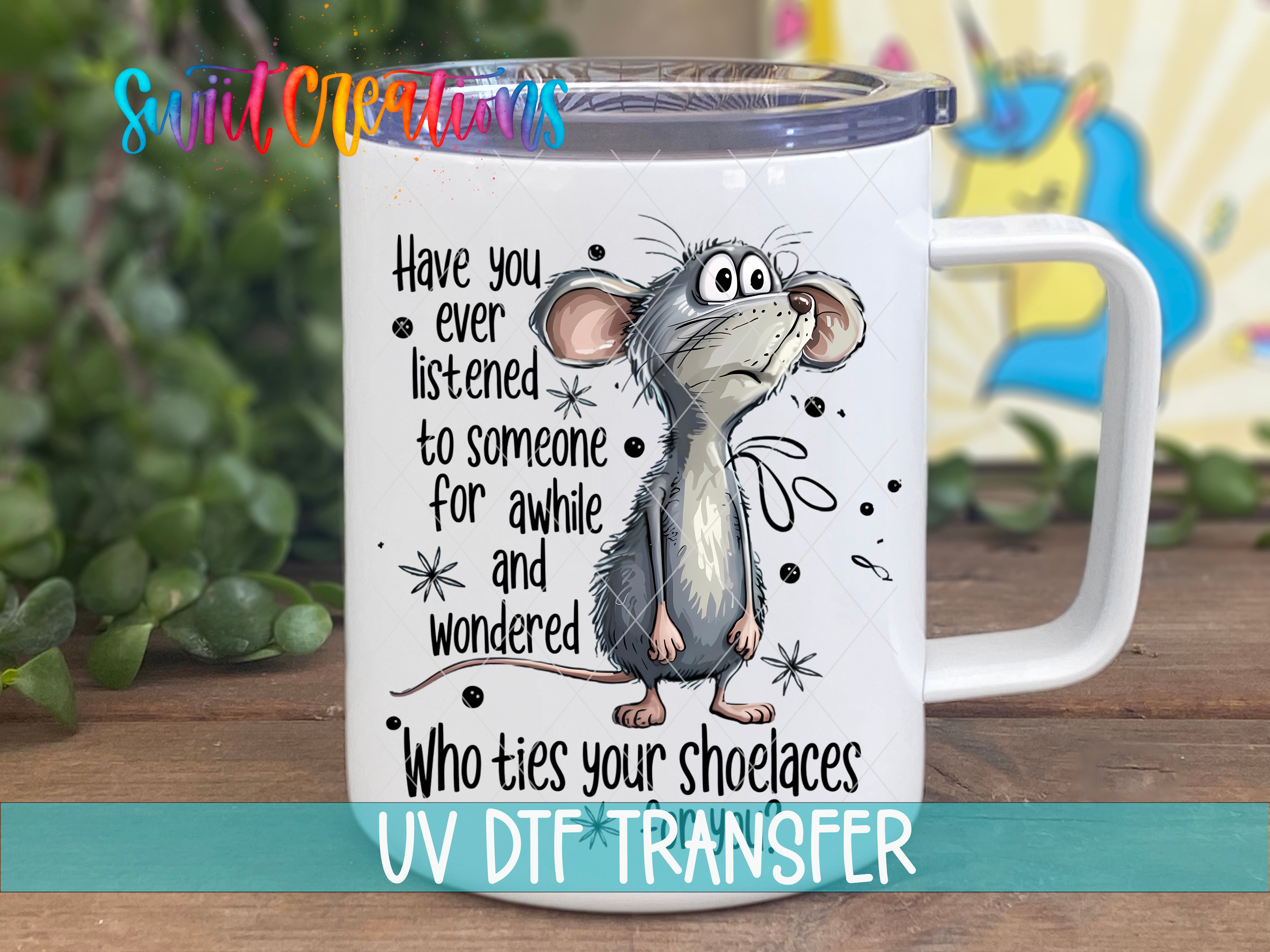 A white mug with a cartoon image of a mouse and text that reads "Have you ever listened to someone for a while and wondered who ties your shoelaces".