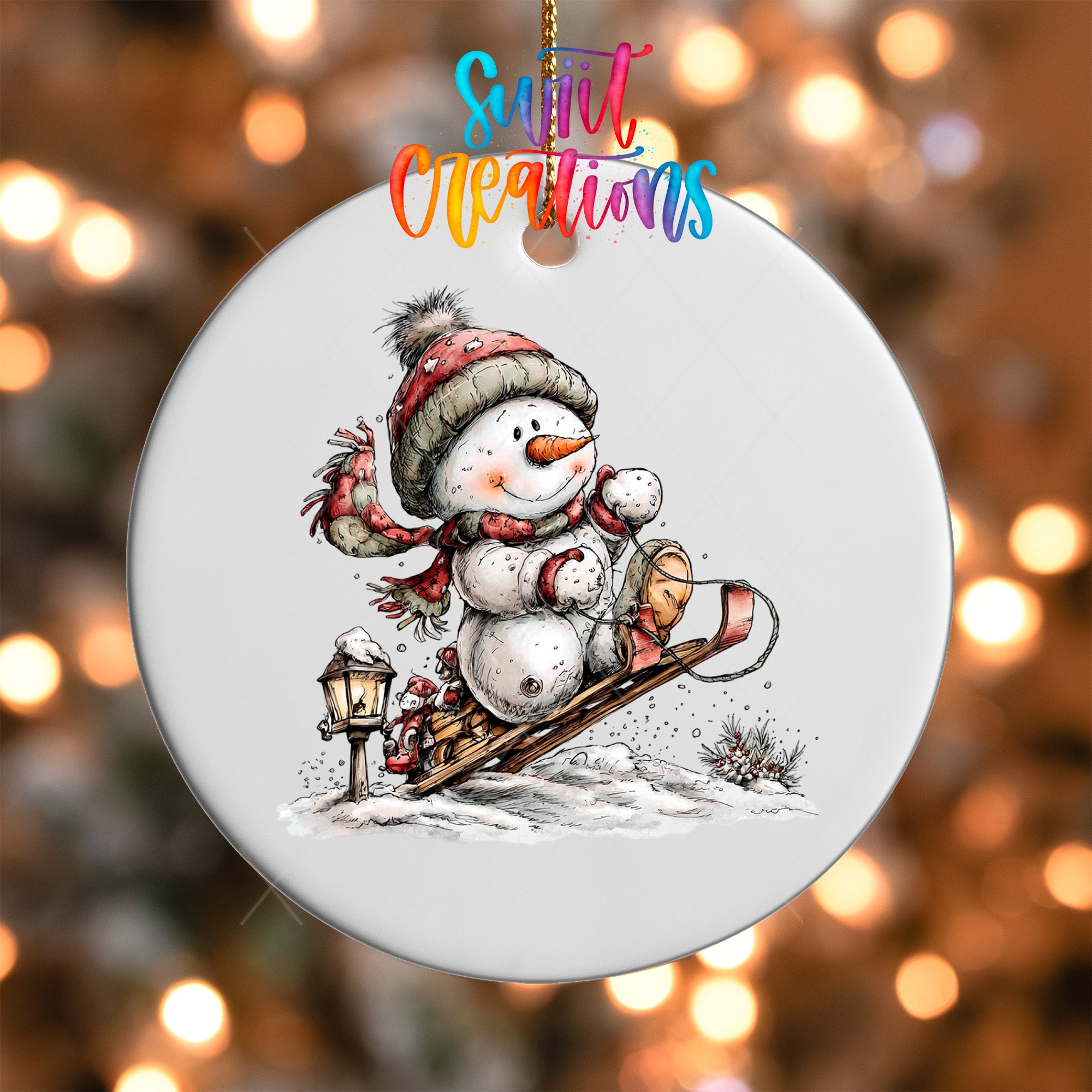 A snowman is depicted riding a sled down a snowy hill, with a lantern and a Christmas tree in the background.