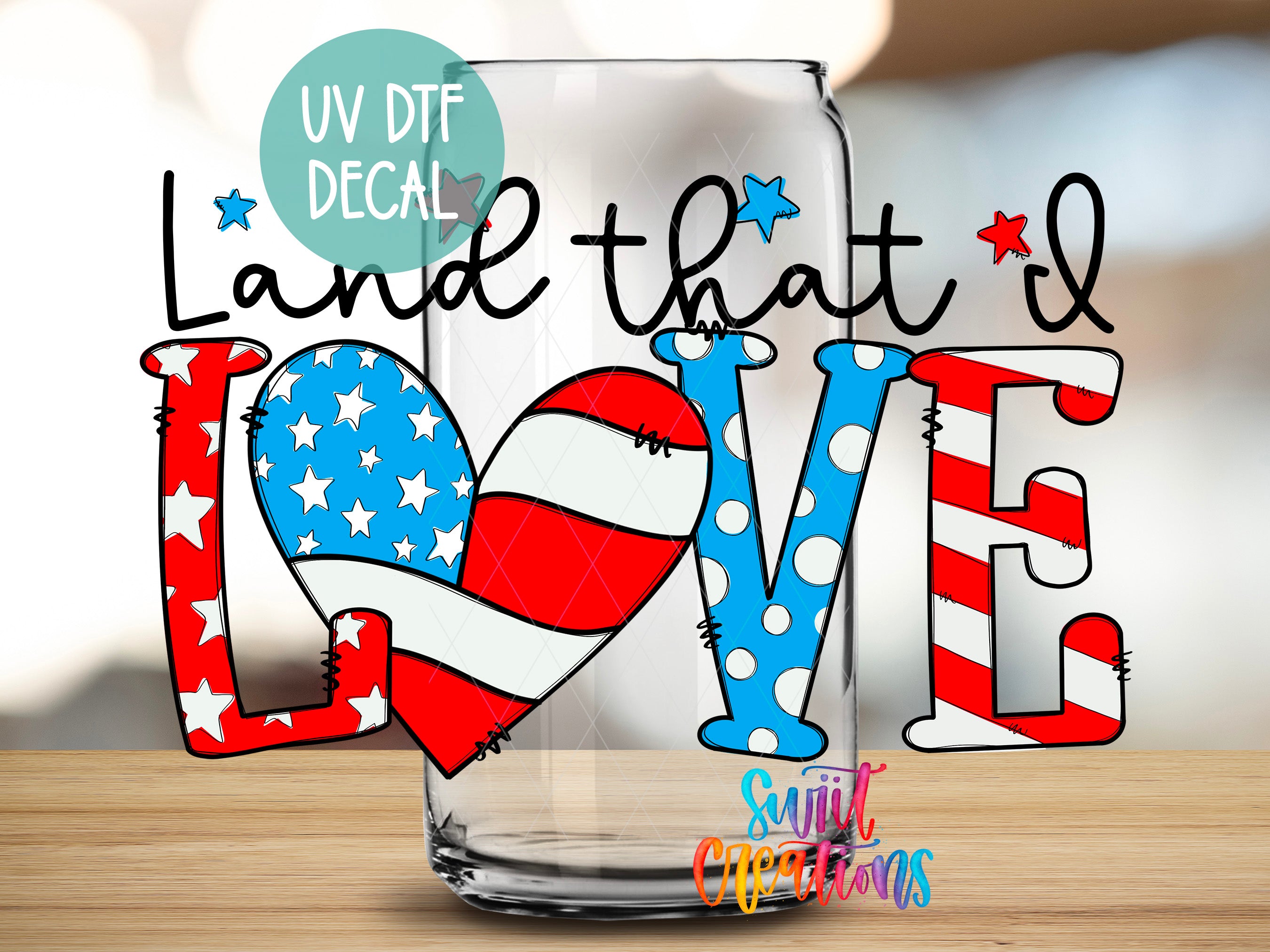 a glass with the text "Land that I Love" written on it, along with an American flag design.