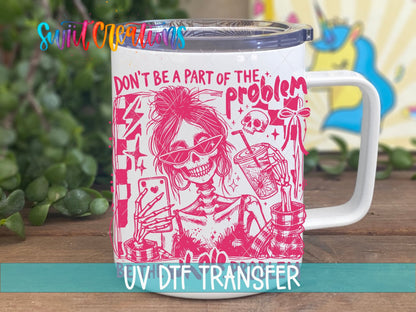 Be The Whole Problem UV DTF transfer displayed on a white coffee mug from Swiit Creations