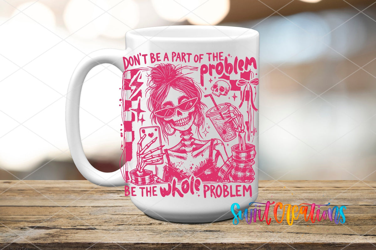 Be The Whole Problem UV DTF transfer displayed on a white ceramic mug from Swiit Creations