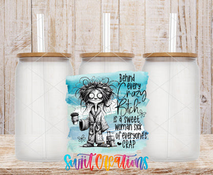 Swiit Creations UV DTF Behind Every Crazy Bitch transfer shown on a clear glass can set
