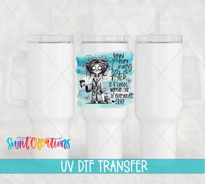 Swiit Creations UV DTF Behind Every Crazy Bitch transfer shown on a white tumbler set