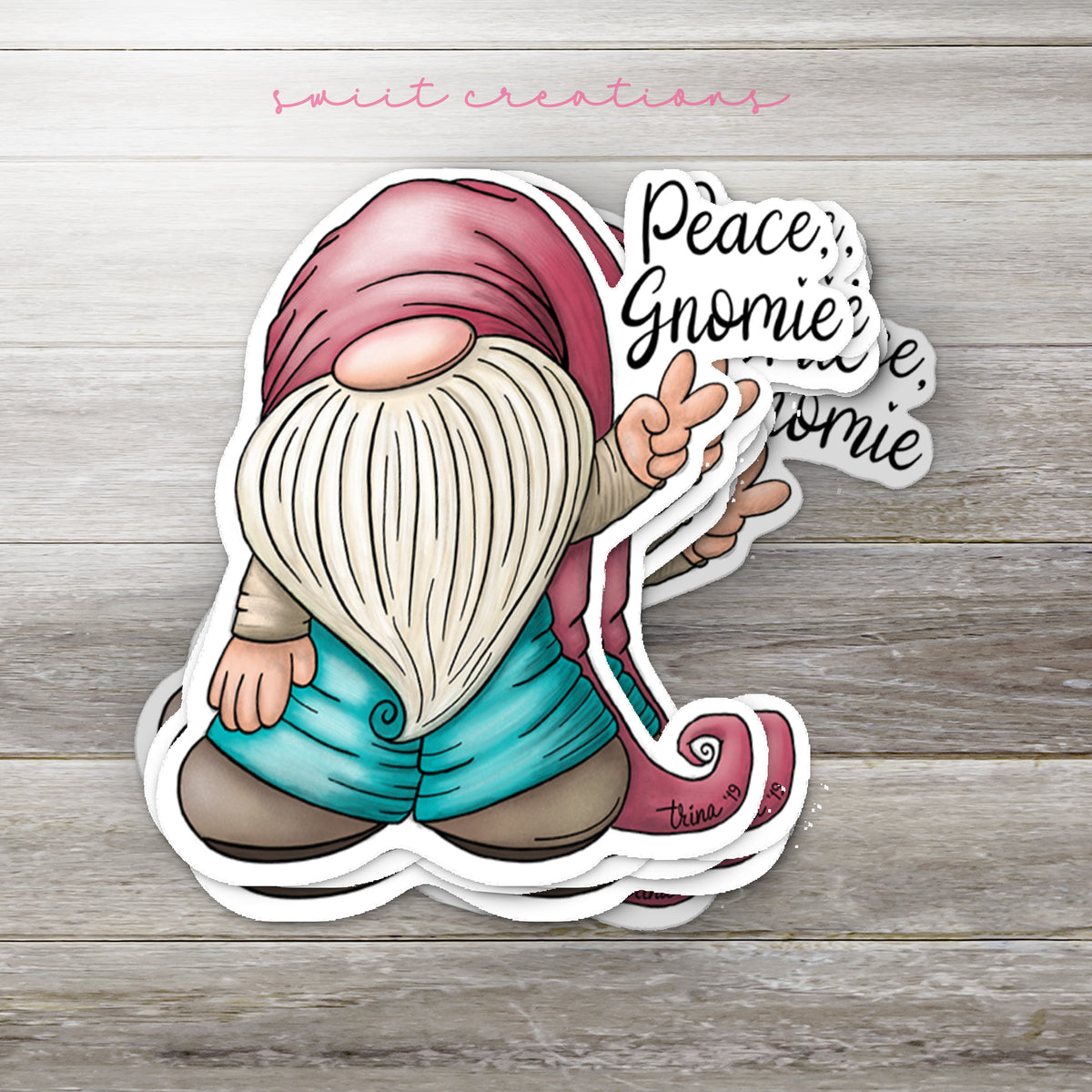 a sticker of a gnome holding a sign that says peace gnomeie's