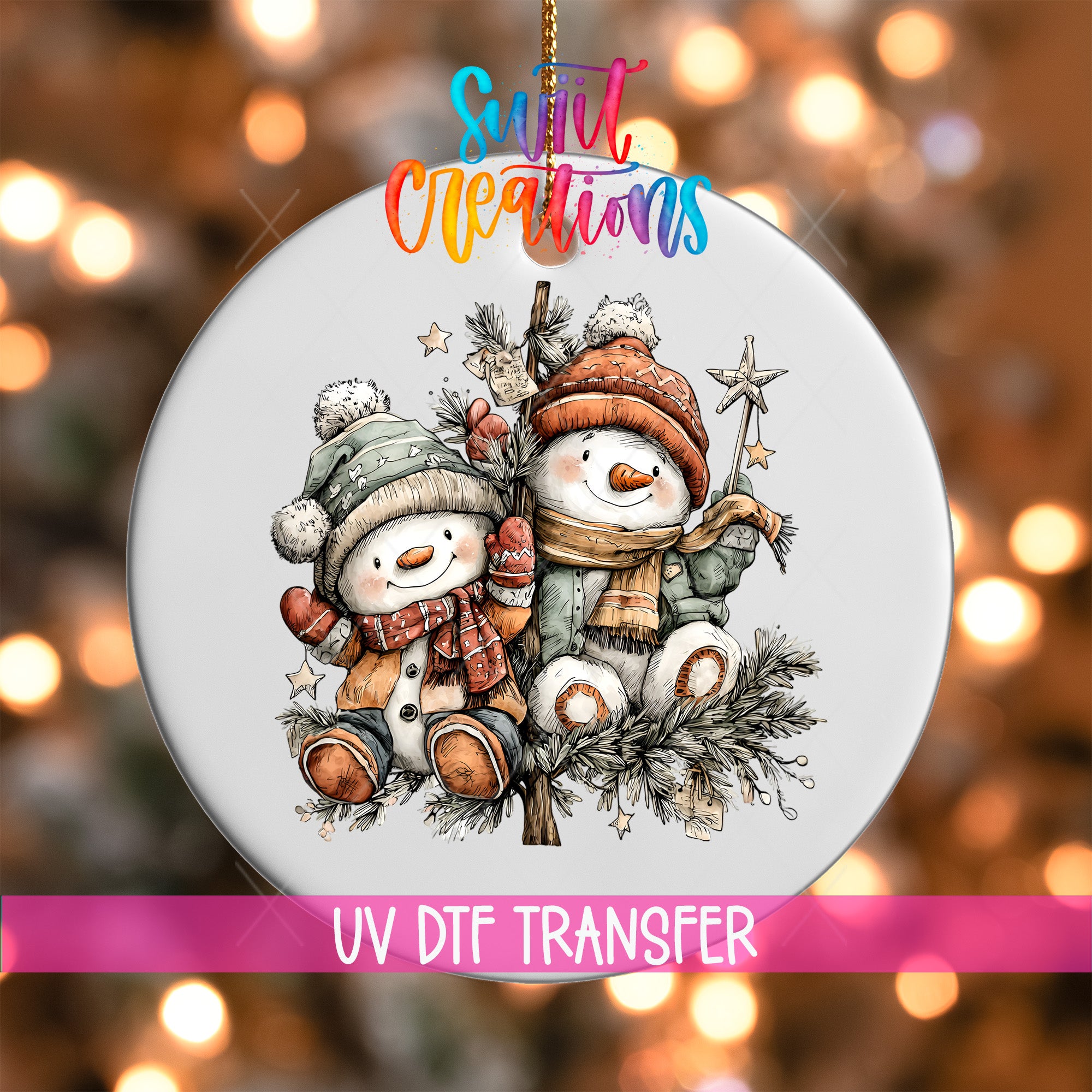 A decorative ornament featuring two snowmen wearing winter hats and scarves, sitting on a branch with pine cones and stars. The ornament is hanging against a background of colorful lights, creating a festive and whimsical atmosphere.