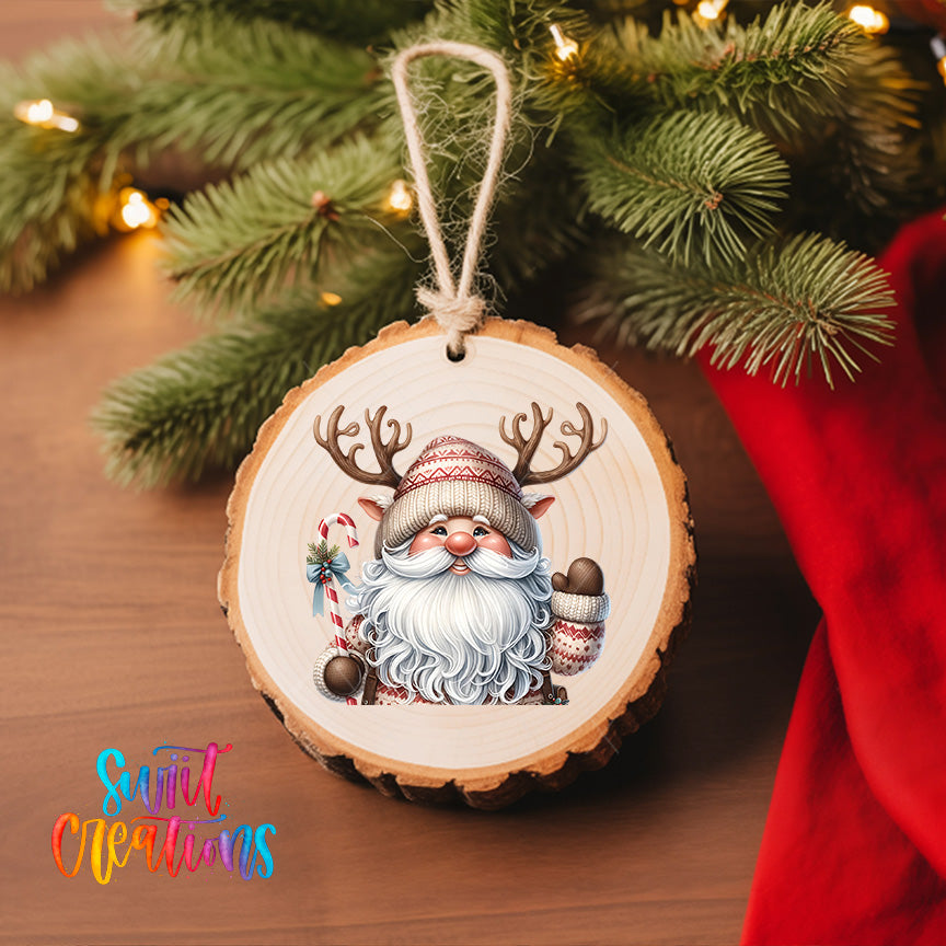 A wooden ornament featuring a Santa Claus figure with antlers and a candy cane, hanging on a Christmas tree.