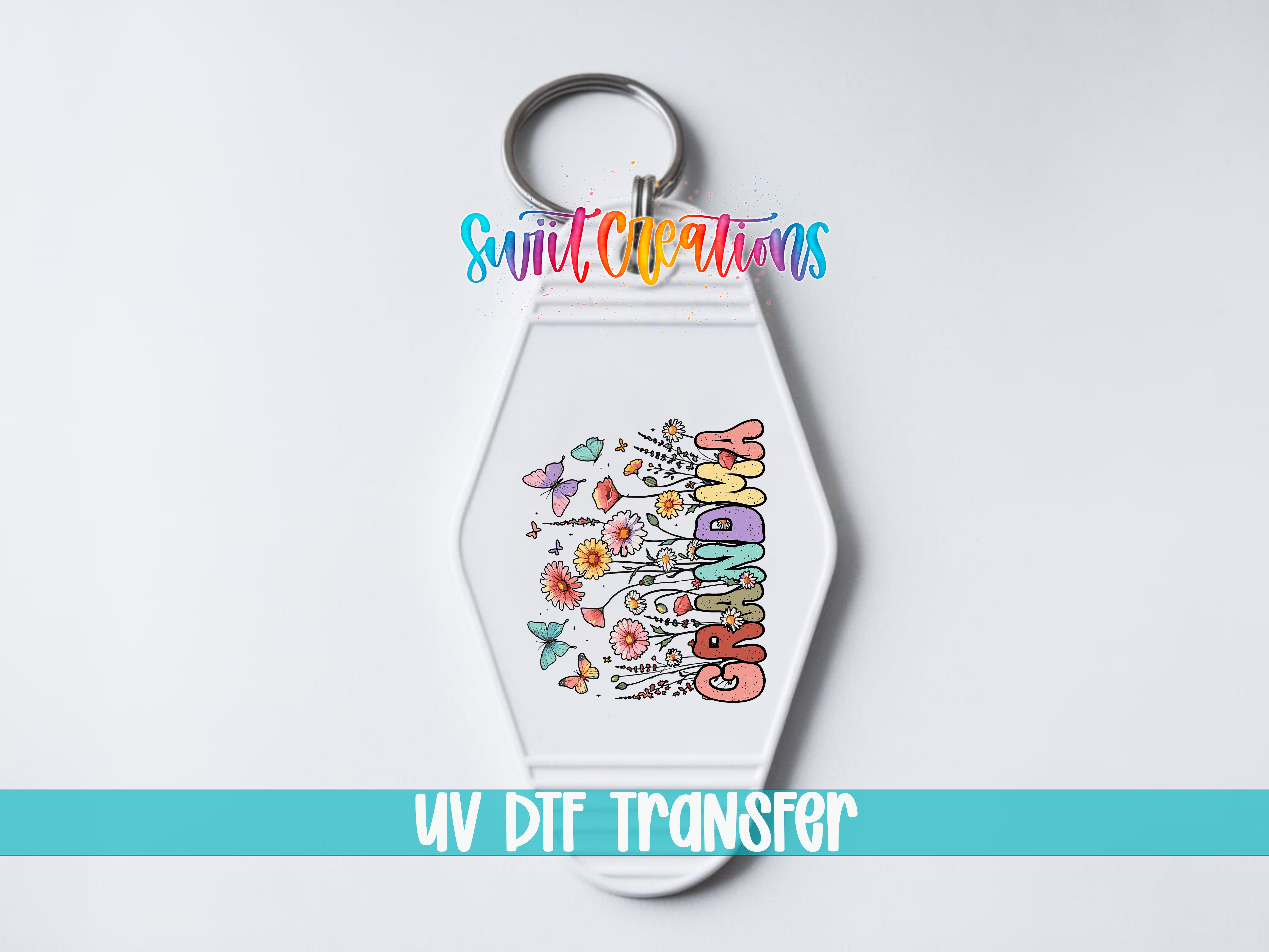 A keychain with a colorful floral design and the word "GRANDMA" printed on it.