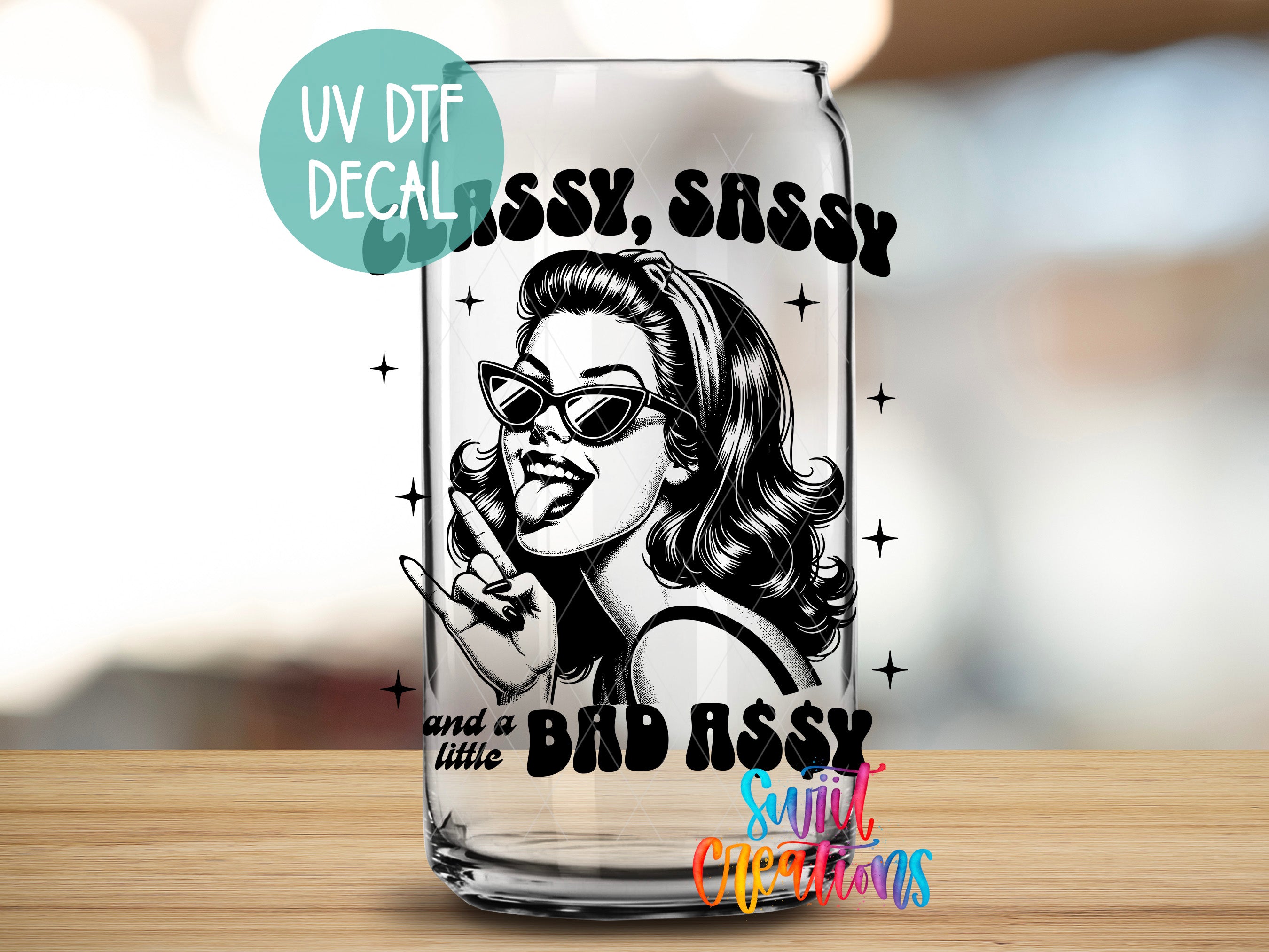 A glass can with a black and white illustration of a woman wearing sunglasses and a sassy expression, along with the text "CLASSY, SASSY and a BAD ASSY" and "SULT CONCEITIONS" printed on it.