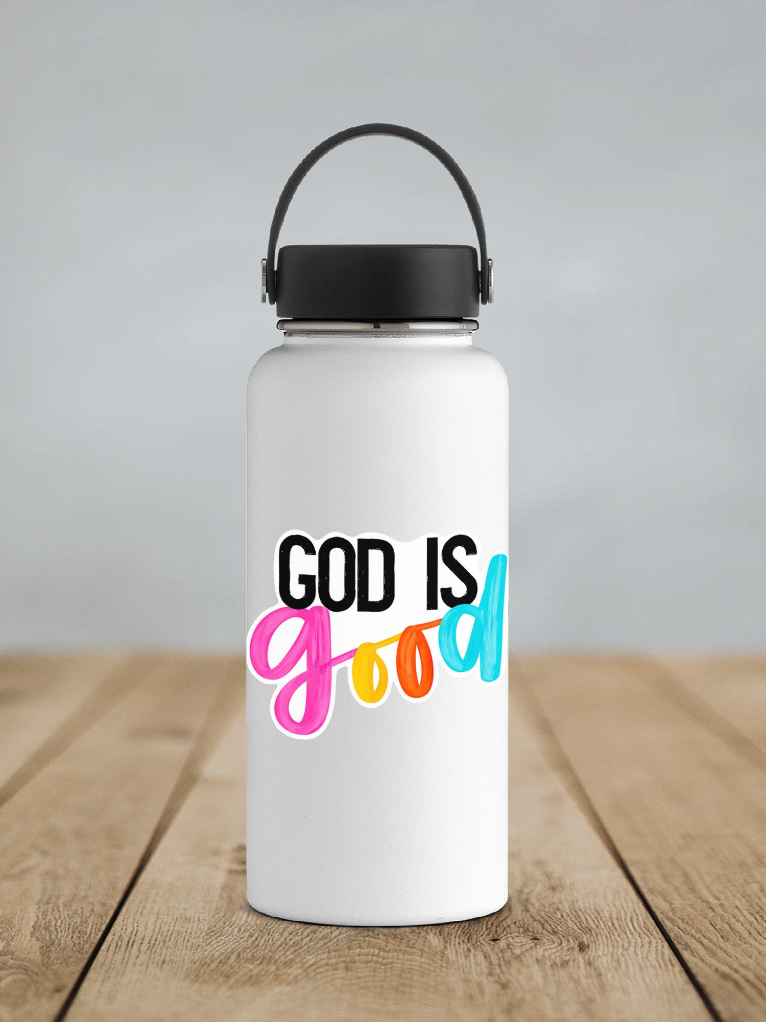 a white water bottle with the words god is good on it