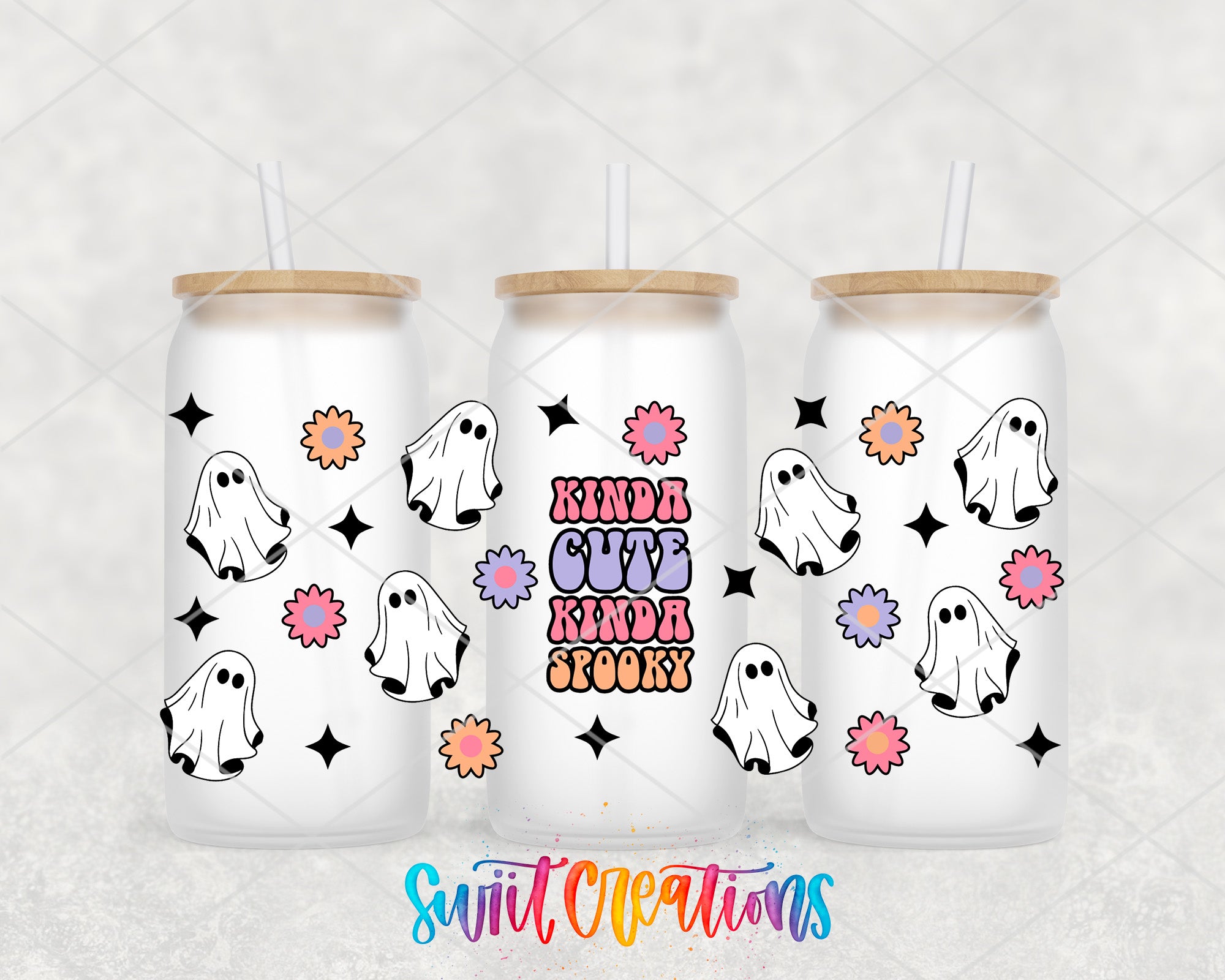 three white tumblers with a ghost design and colorful flowers on them.