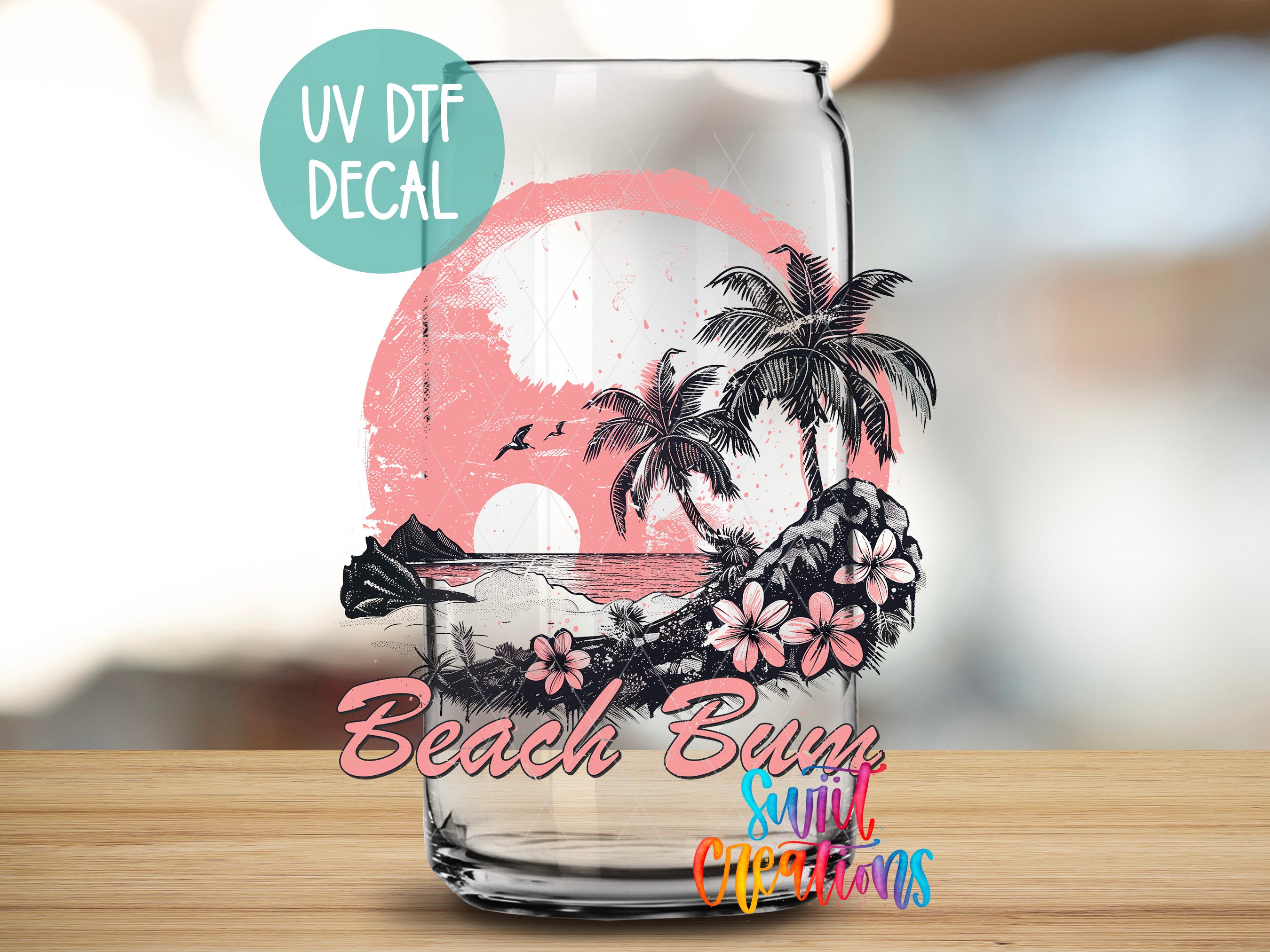a glass with a picture of a beach and palm trees
