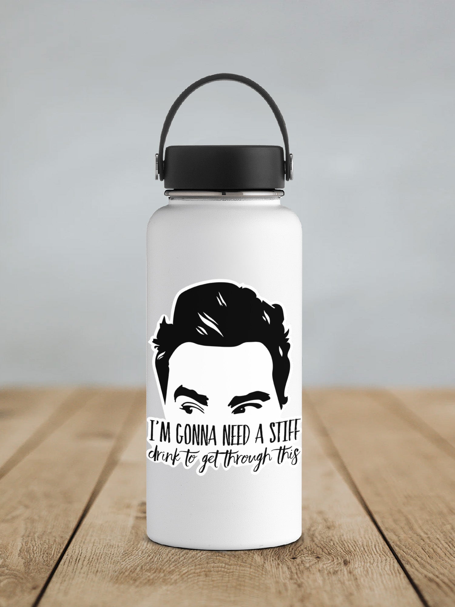 a water bottle with a picture of a man's face on it