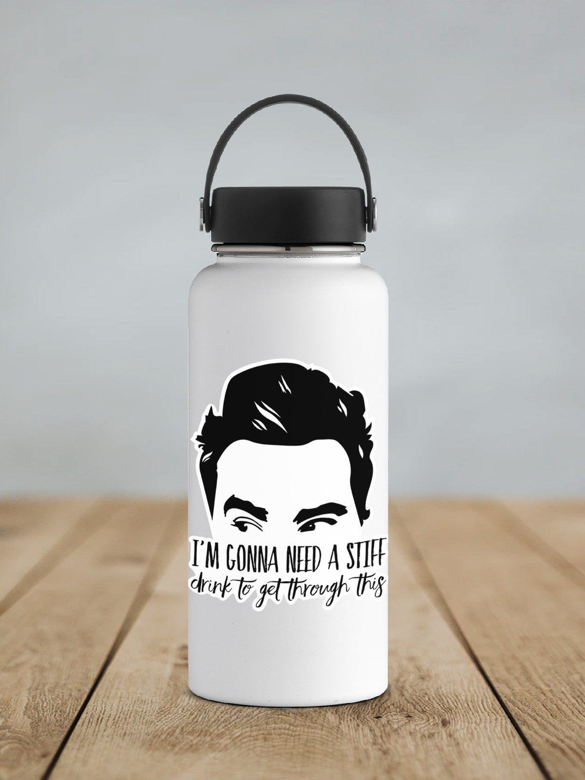 a water bottle with a picture of a man's face on it