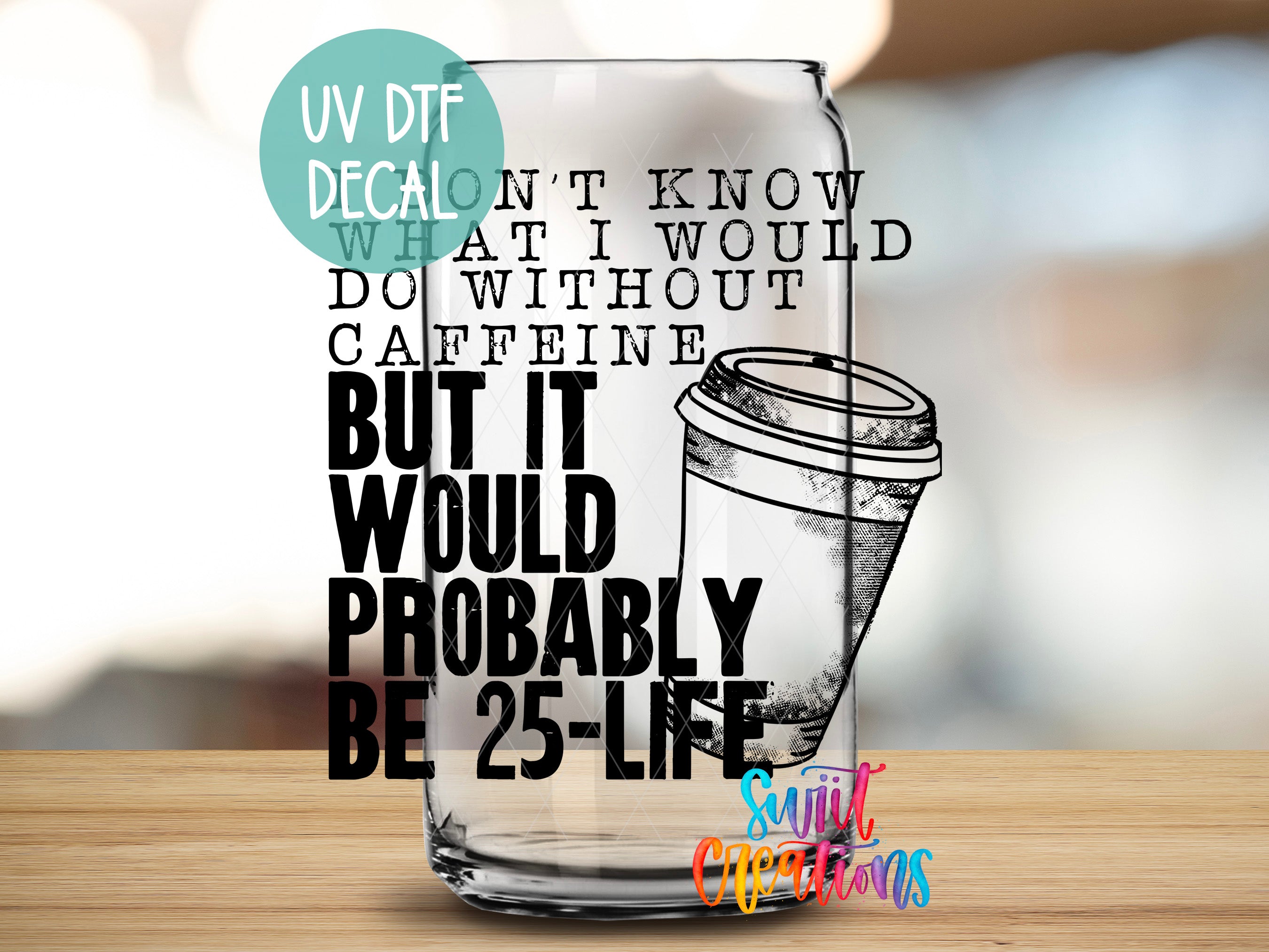 a glass with a quote on it sitting on a table