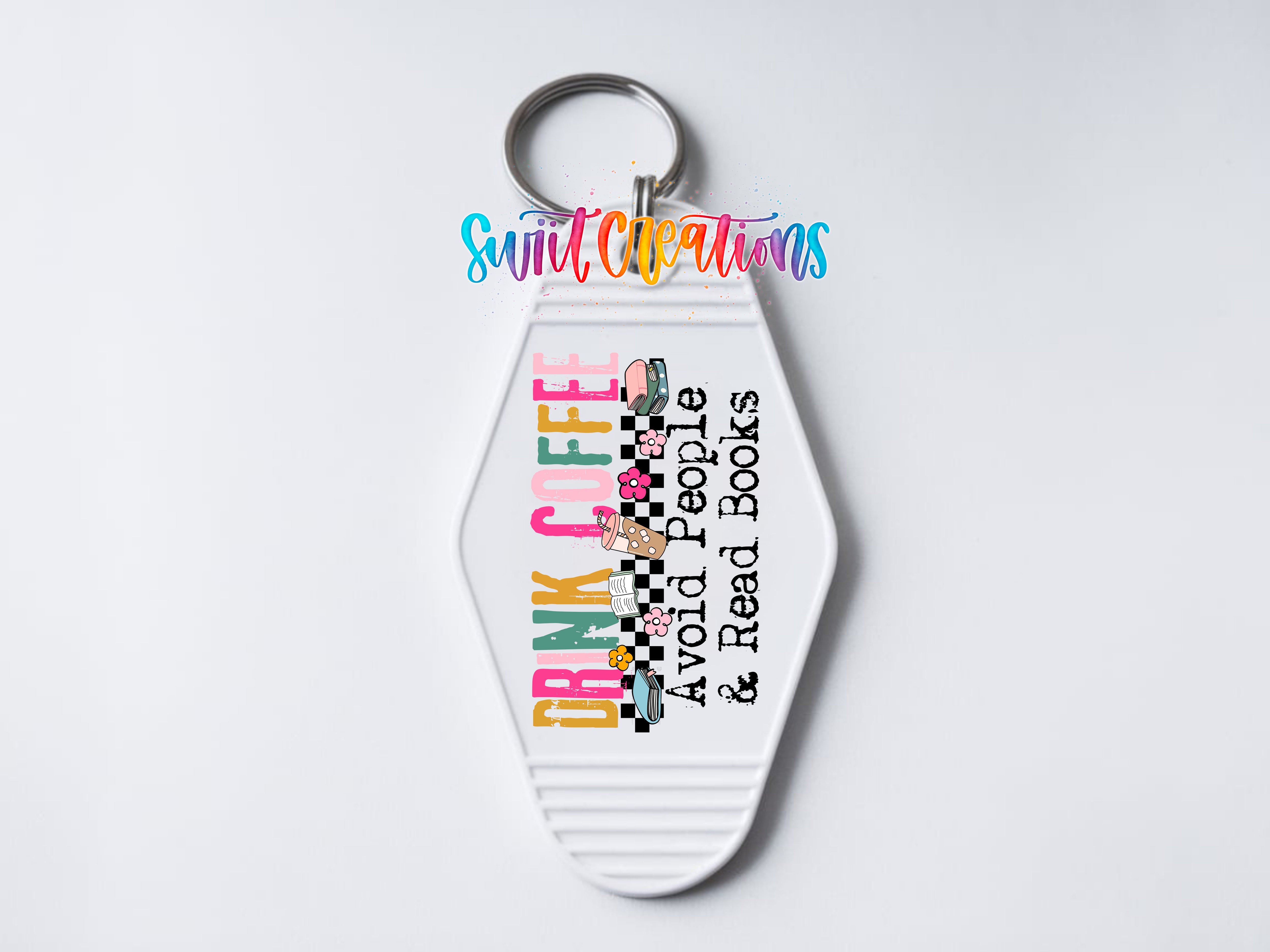 A keychain with a colorful design and text that says "Drink Coffee Avoid People Read Books".