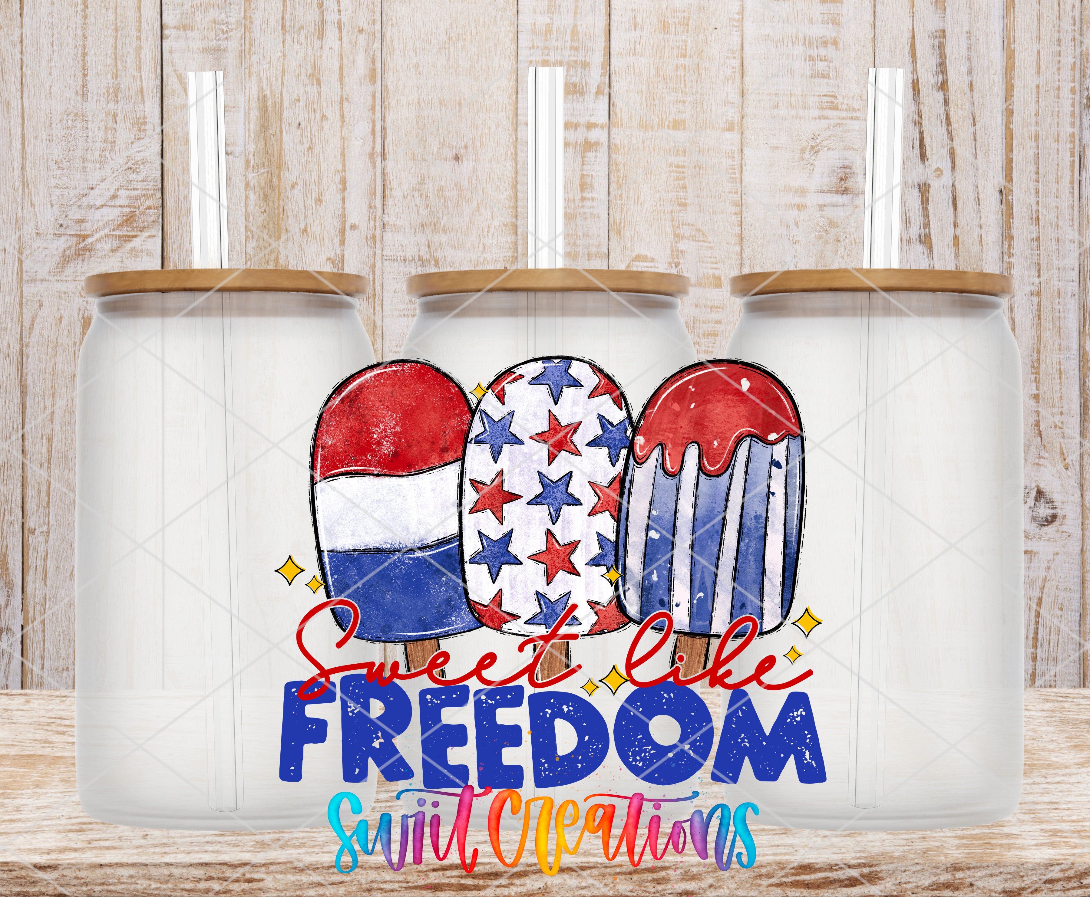 three glass jars with lids, each decorated with a patriotic design of a popsicle or popsicle-shaped container, along with the text "Sweet like freedom" and "Swift Creations" written on them.