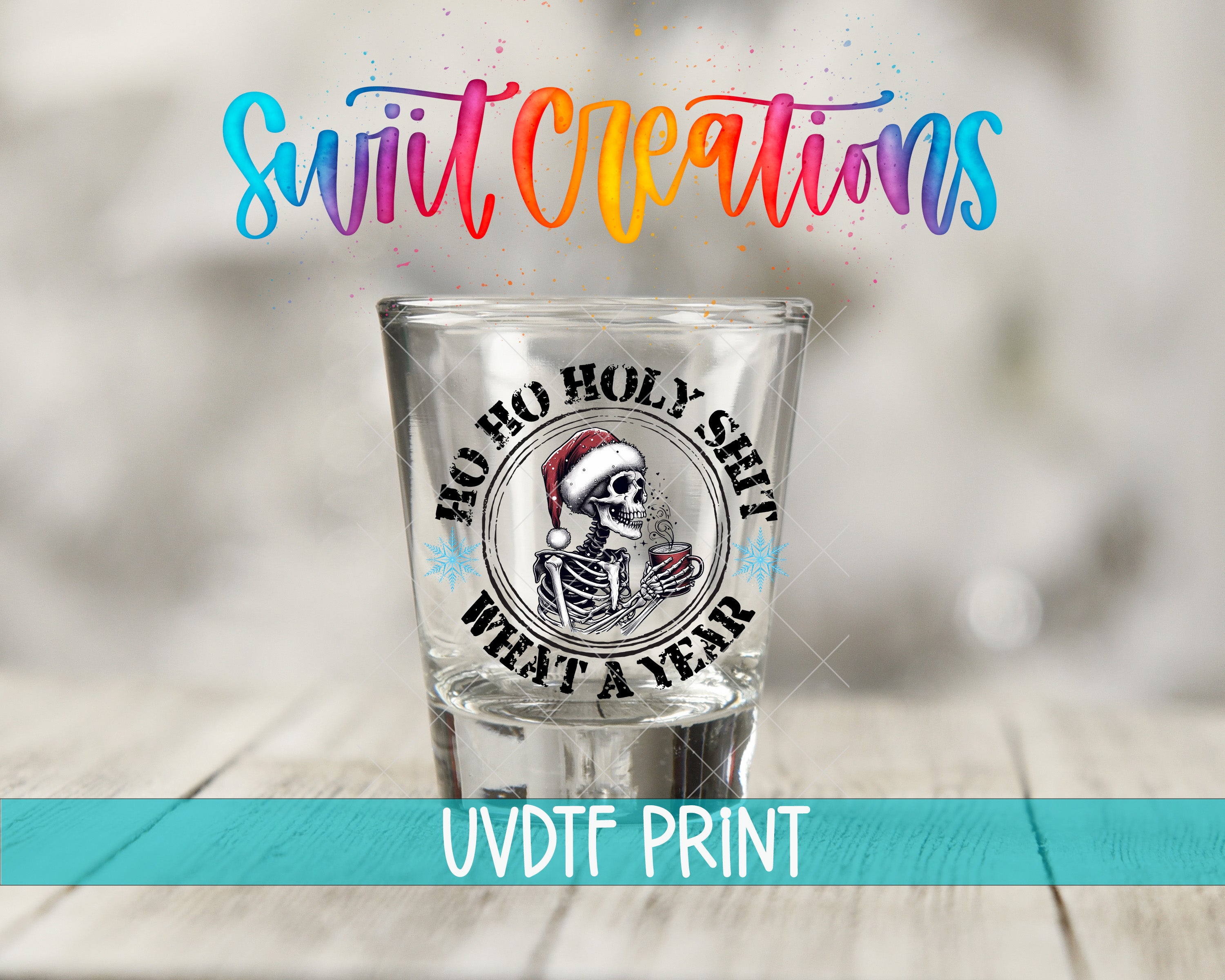 A shot glass with a skull wearing a Santa hat and the text "No Ho Holy shit What a year" printed on it, along with the text "Swit Creations" and "UVDF PRINT" at the bottom.