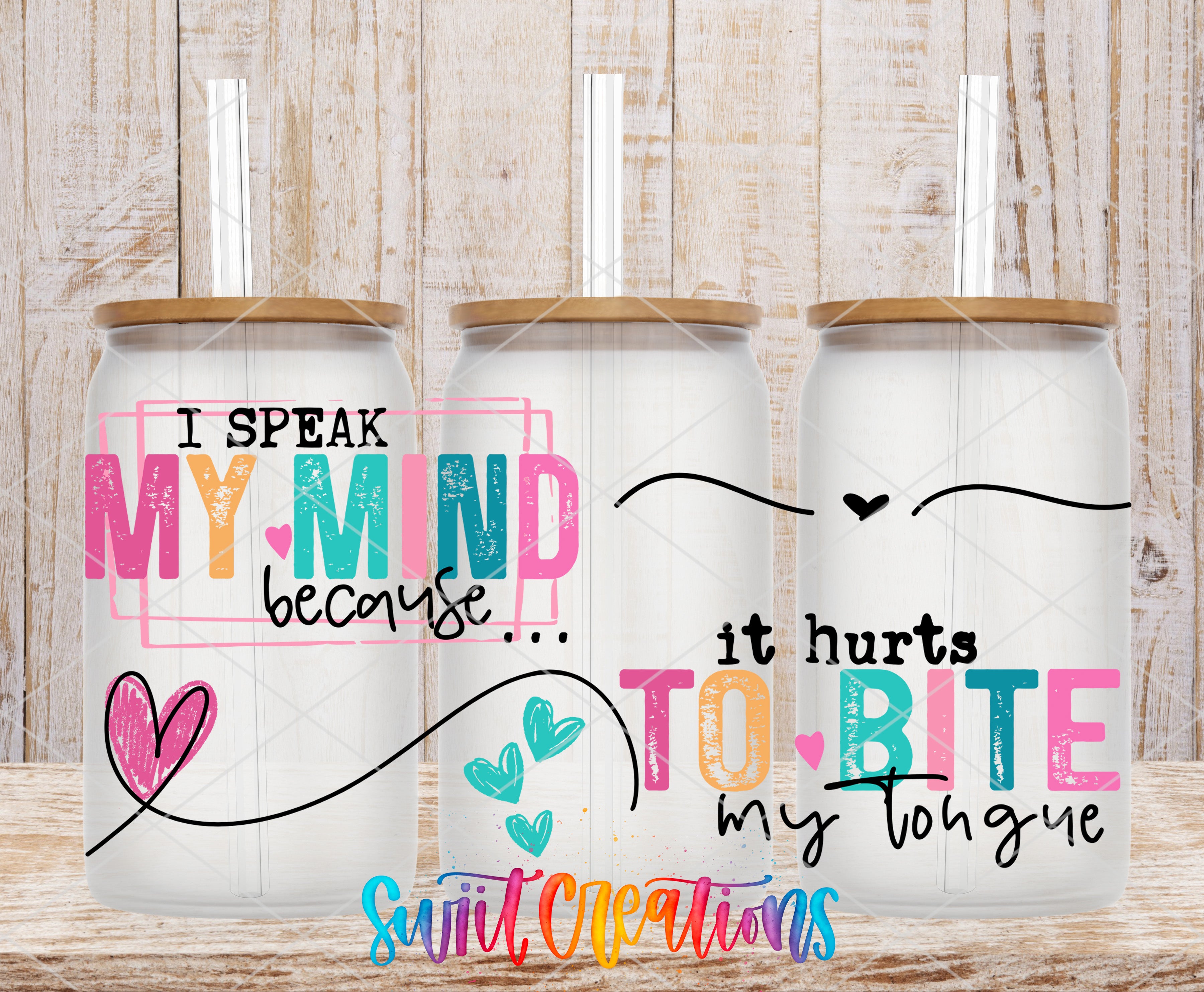 three colorful glass tumblers with text and heart designs on them.