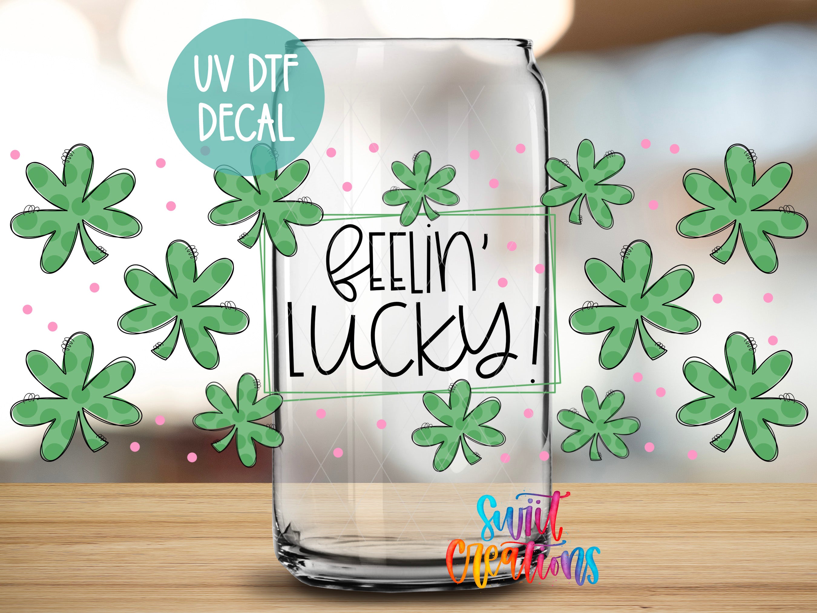 a clear glass jar with a hand-drawn design of green shamrocks surrounding it, along with the text "Feelin' Lucky!" written on the jar.