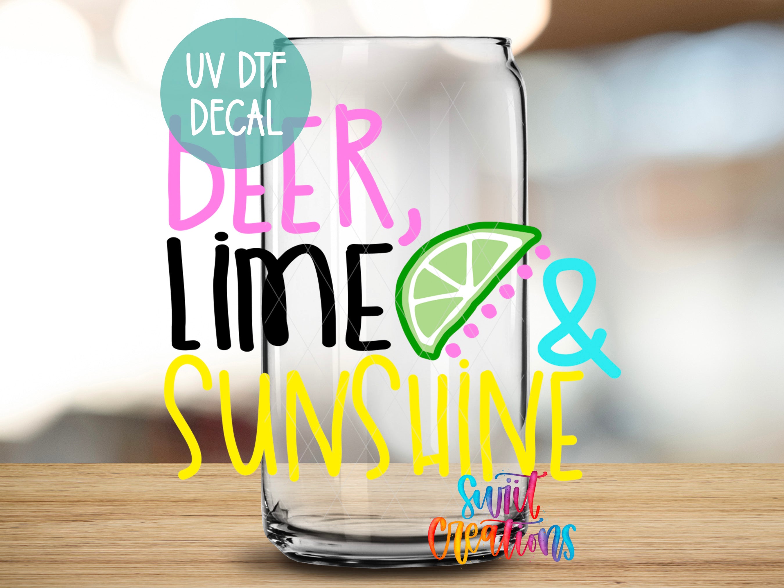 a glass with a lime and a slice of lime on it