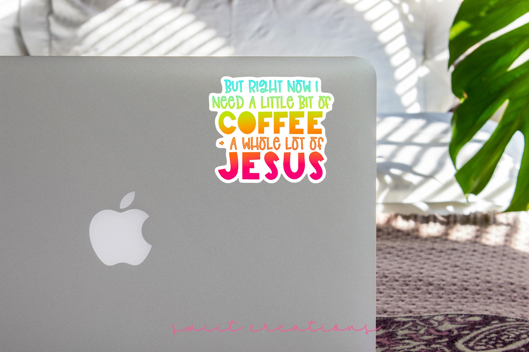 a laptop computer sitting on top of a table