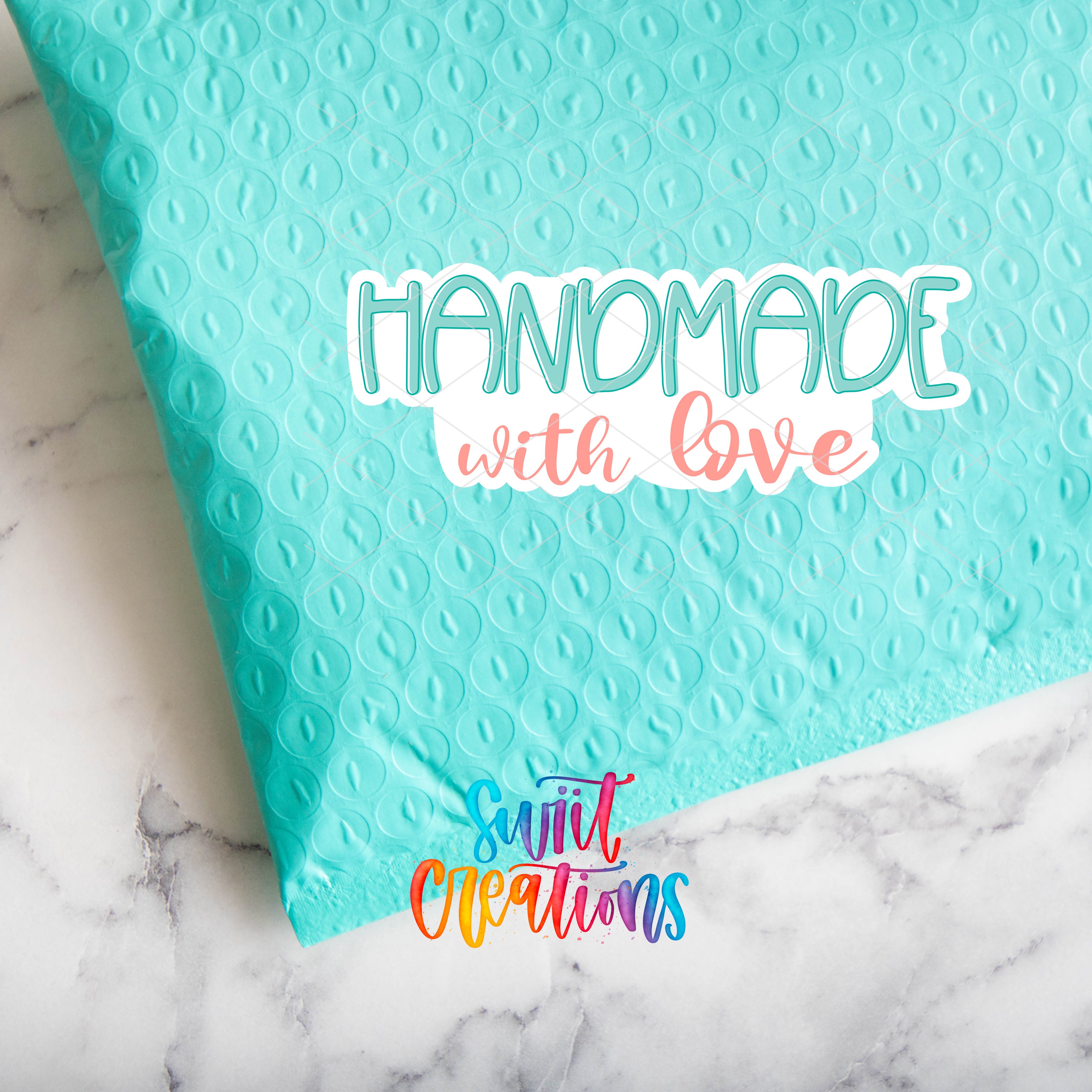 a blue bag with a handmade with love sticker on it