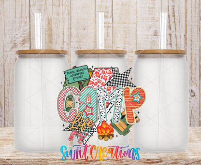 Camp Life Adventure Camping UV DTF transfer applied to a clear glass can set from Swiit Creations