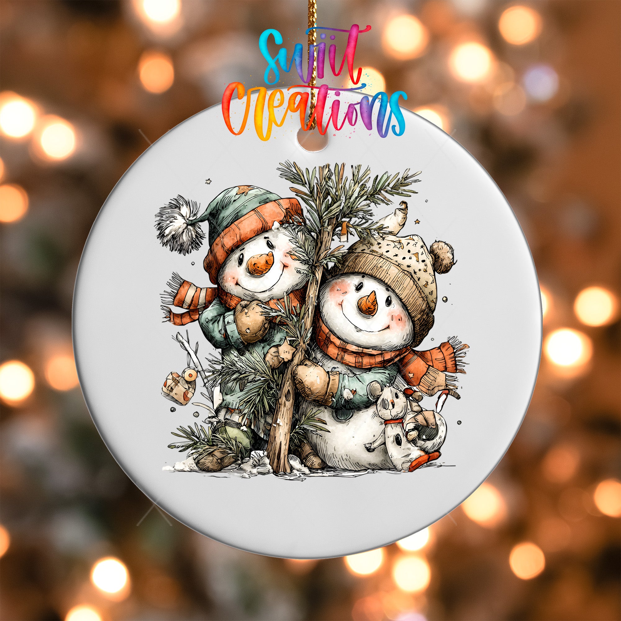 A white ornament featuring two cheerful snowmen, one standing and one sitting, surrounded by pine branches and other festive elements.