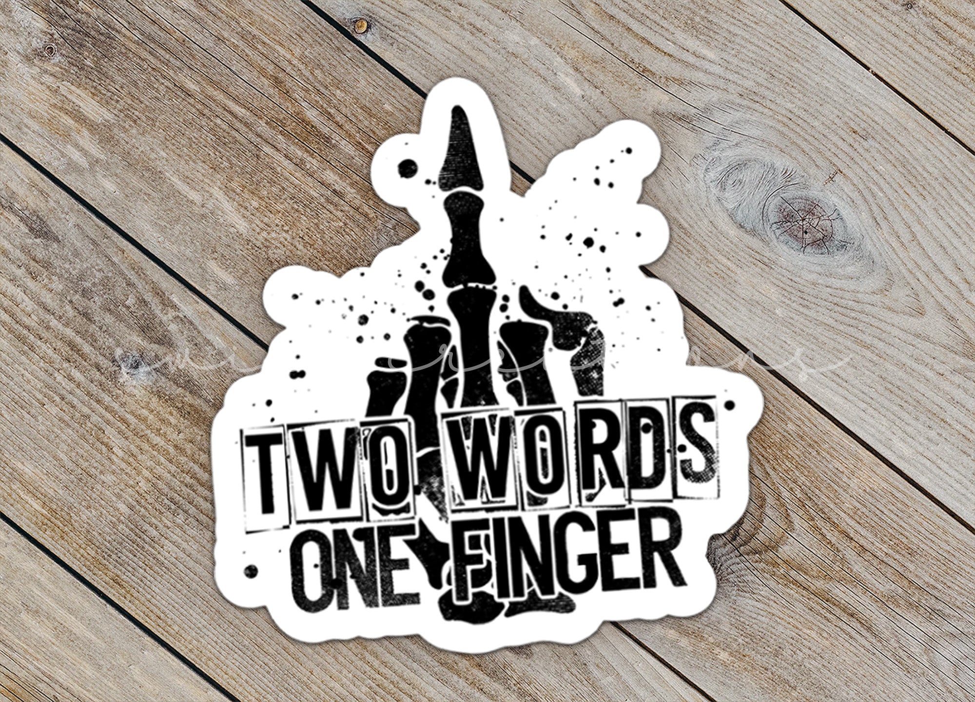 a sticker that says two words one finger