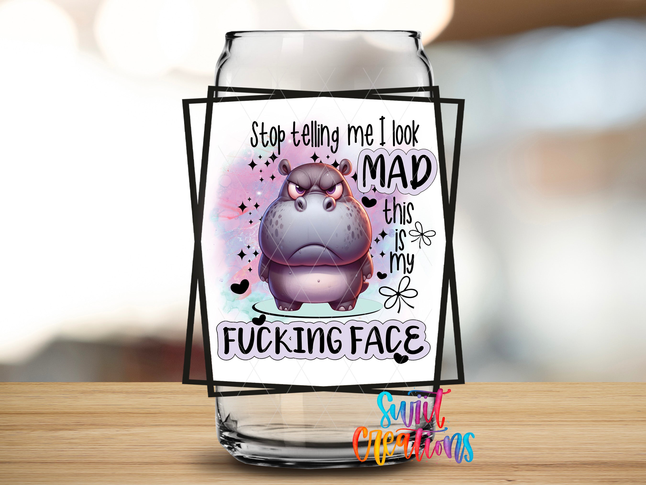a cartoon hippopotamus with a humorous caption that reads "Stop telling me, I look MAD this is my FUCKING FACE".