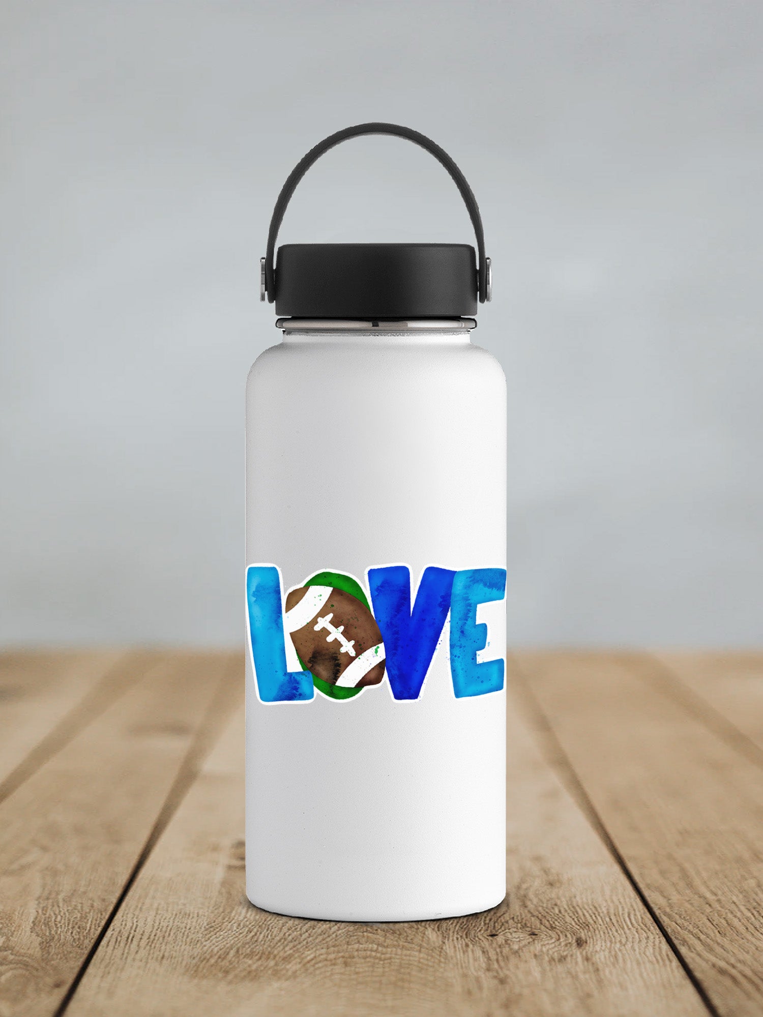 a white water bottle with the word love and a football on it