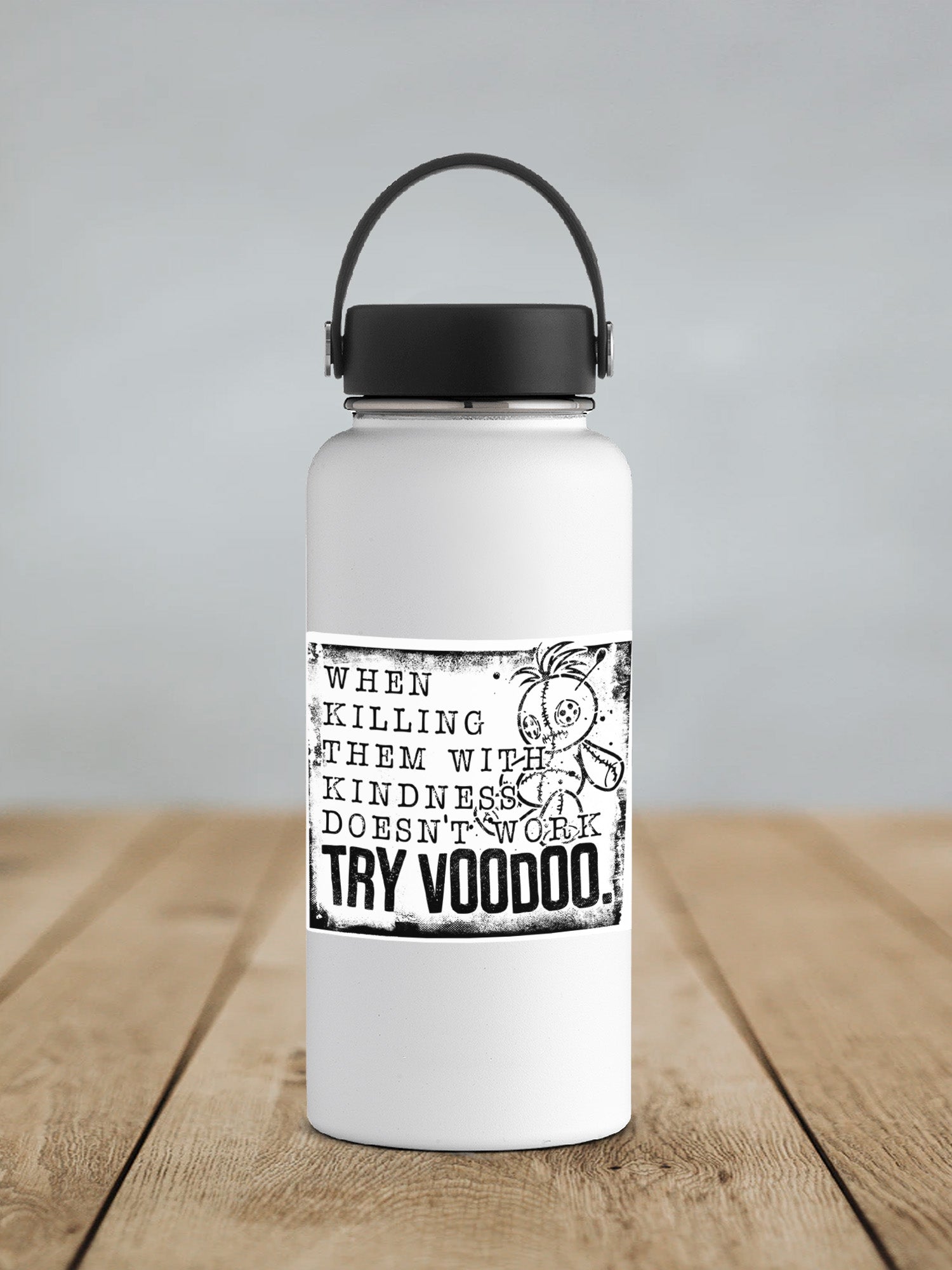 a white water bottle sitting on top of a wooden table