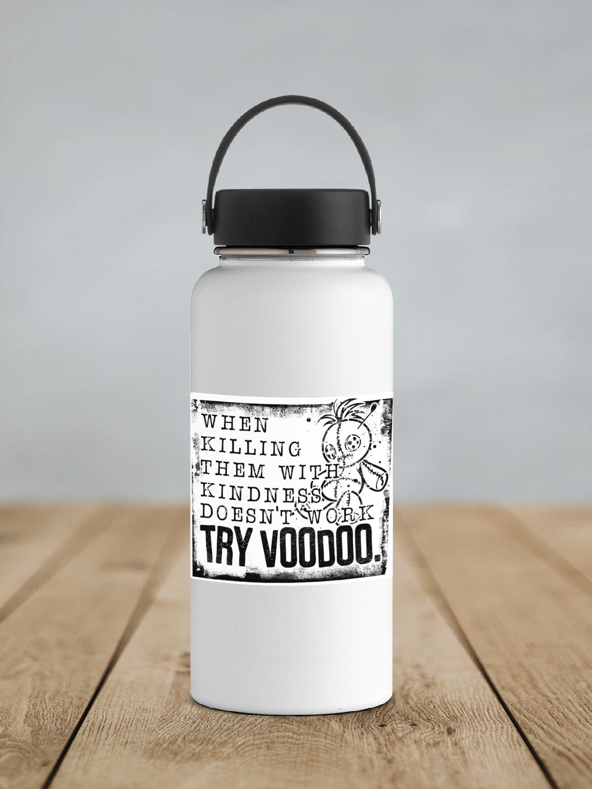a white water bottle sitting on top of a wooden table