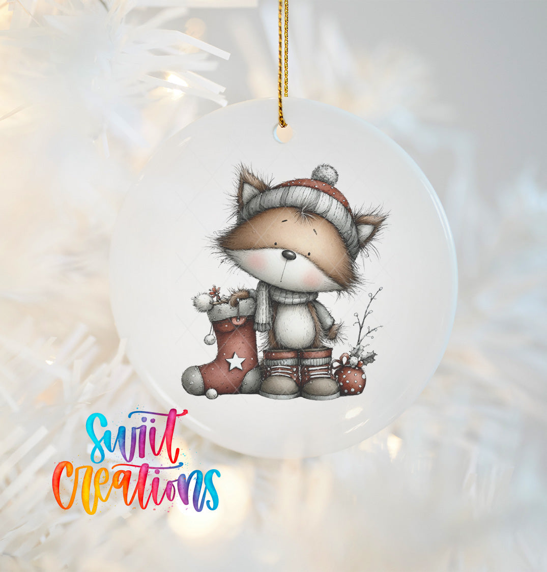 A ceramic ornament featuring a cartoon fox wearing a hat and boots, holding a stocking and a star, with a Christmas tree in the background.