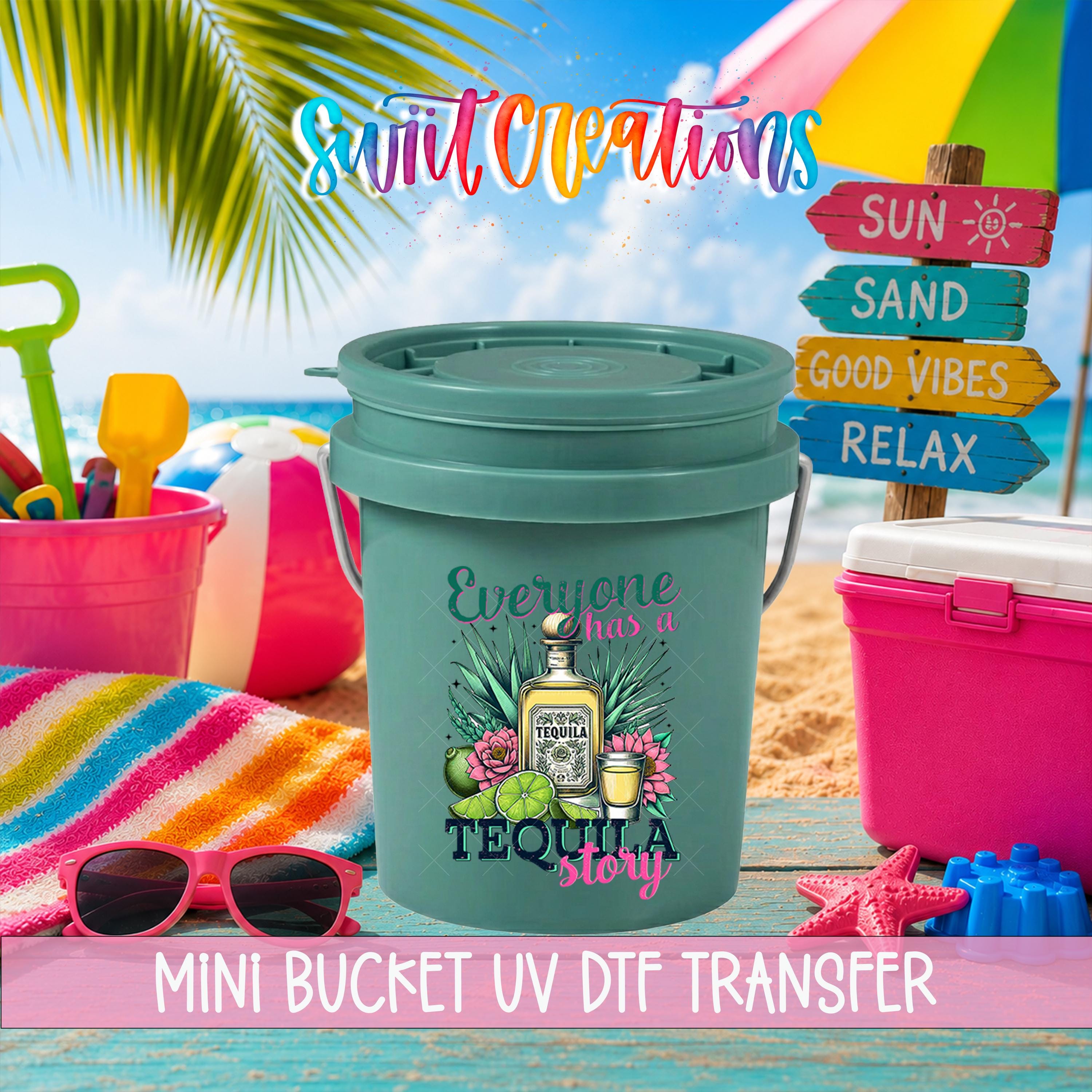 a green bucket with a tequila-themed design, surrounded by beach-related items such as a beach umbrella, sunglasses, and a beach towel.